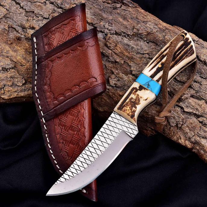 Malika Knives cowboy knife with D2 steel blade, 5mm thickness, antler and turquoise handle, simple and rugged design.