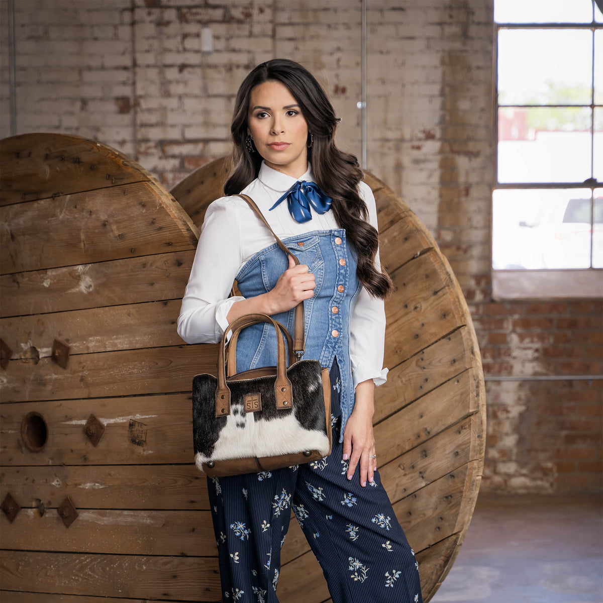Cowhide Josie Satchel by Shawnee Outfitters, featuring a stylish, textured cowhide leather design and sturdy handles.