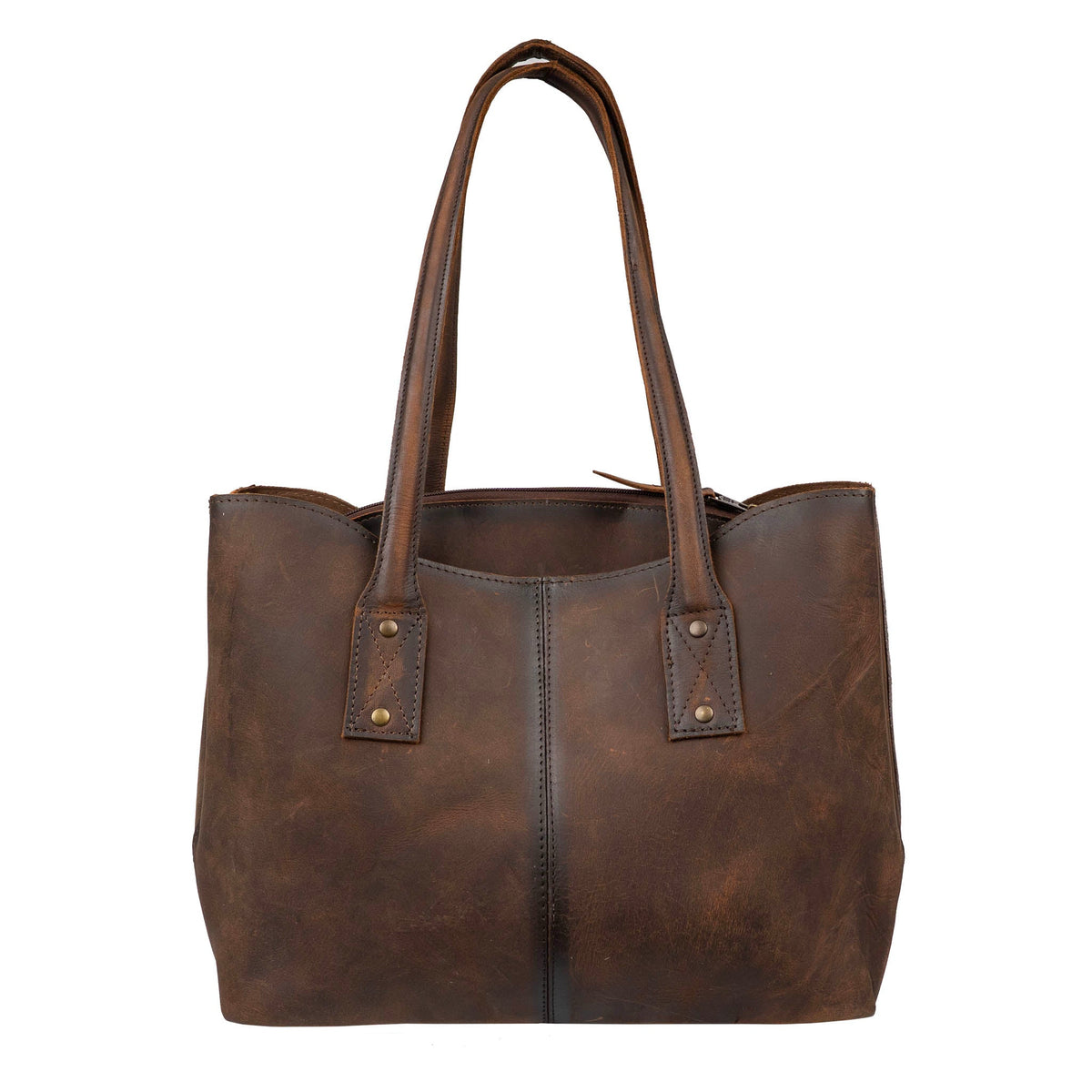 Cowhide Josie Tote by STS Ranchwear featuring a classic cowhide pattern, leather handles, and spacious interior for versatile use.
