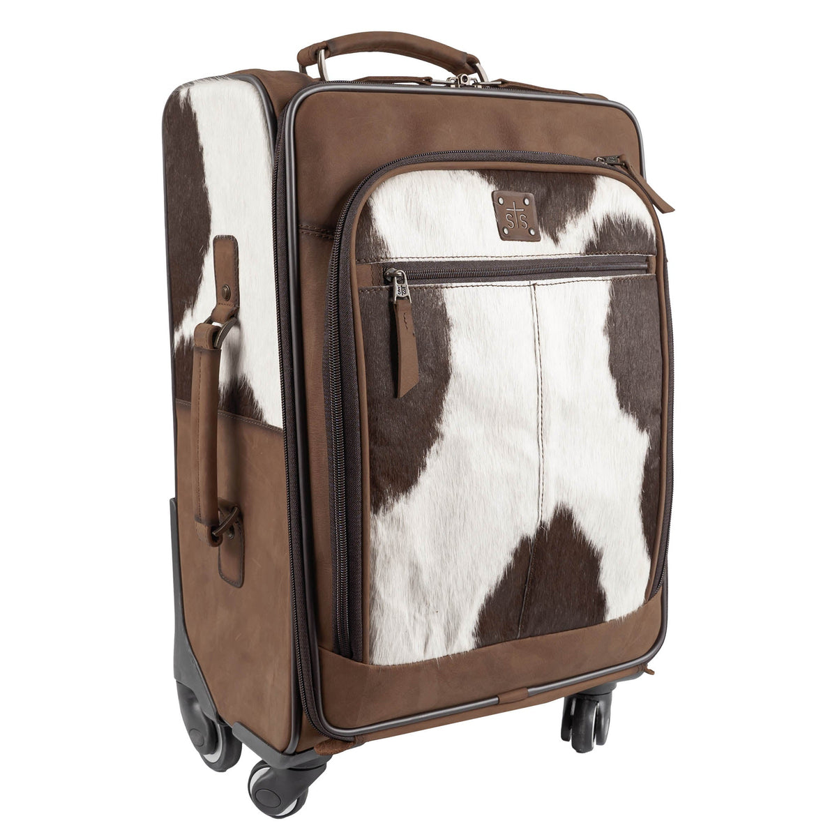 Cowhide rolling suitcase by STS Ranchwear with leather accents and sturdy wheels, stylish travel luggage for women and men.