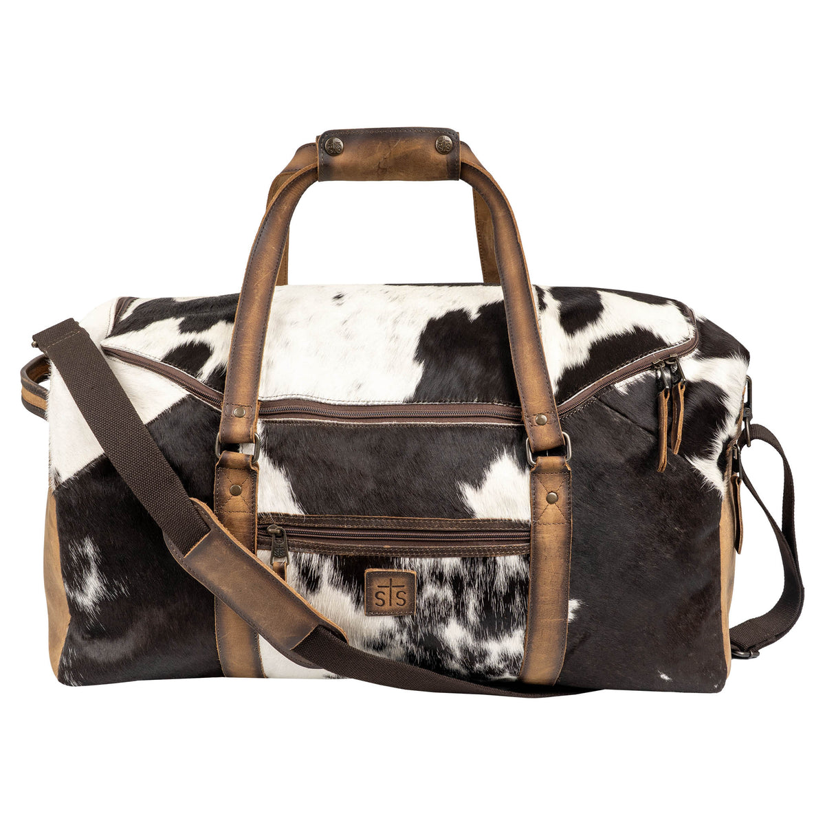 STS Ranchwear Cowhide Rustler Duffle bag in natural cowhide leather with sturdy handles and spacious interior for travel or gym use.