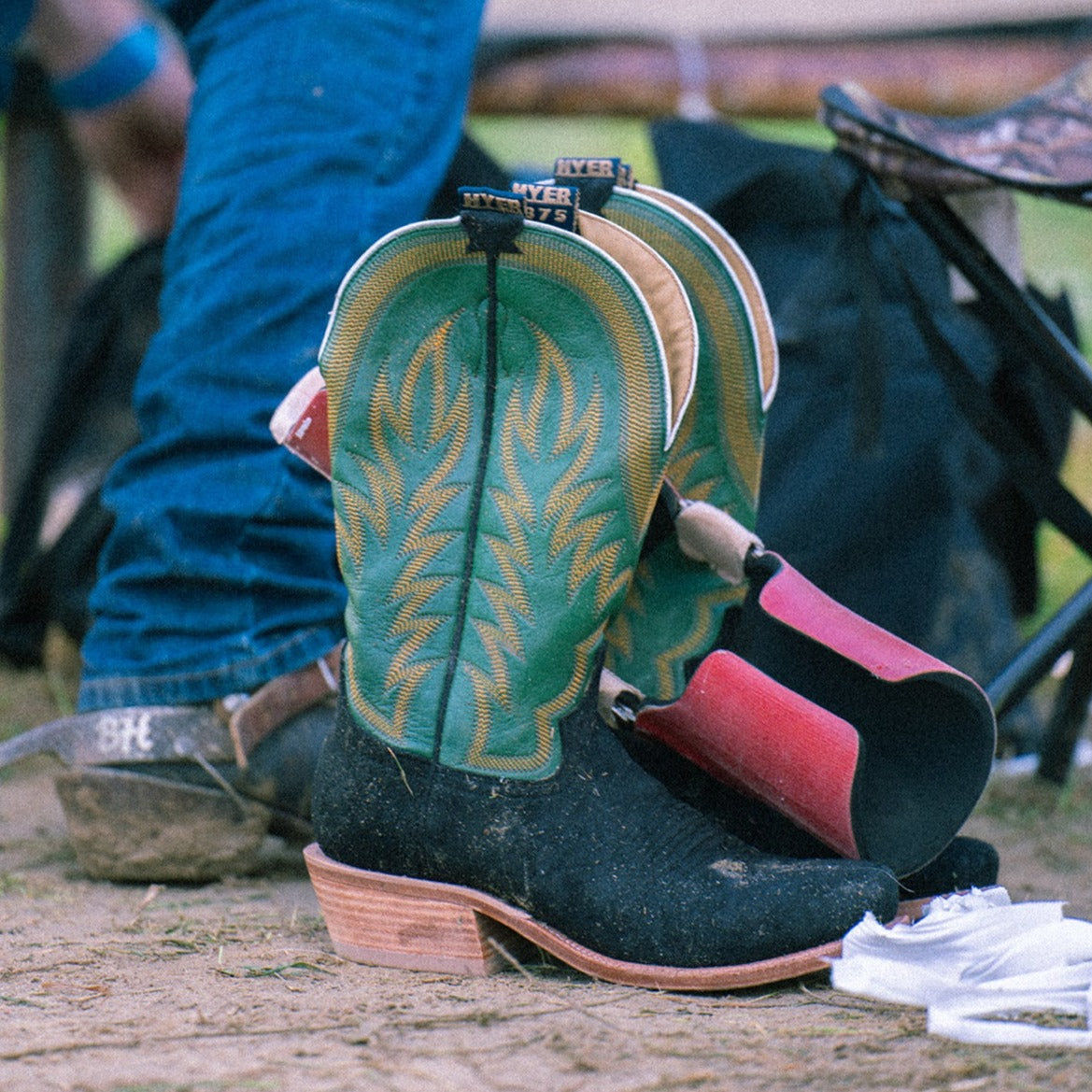 HYER Men's Culver cowboy boots in black and grass color, featuring classic Western design and leather construction.