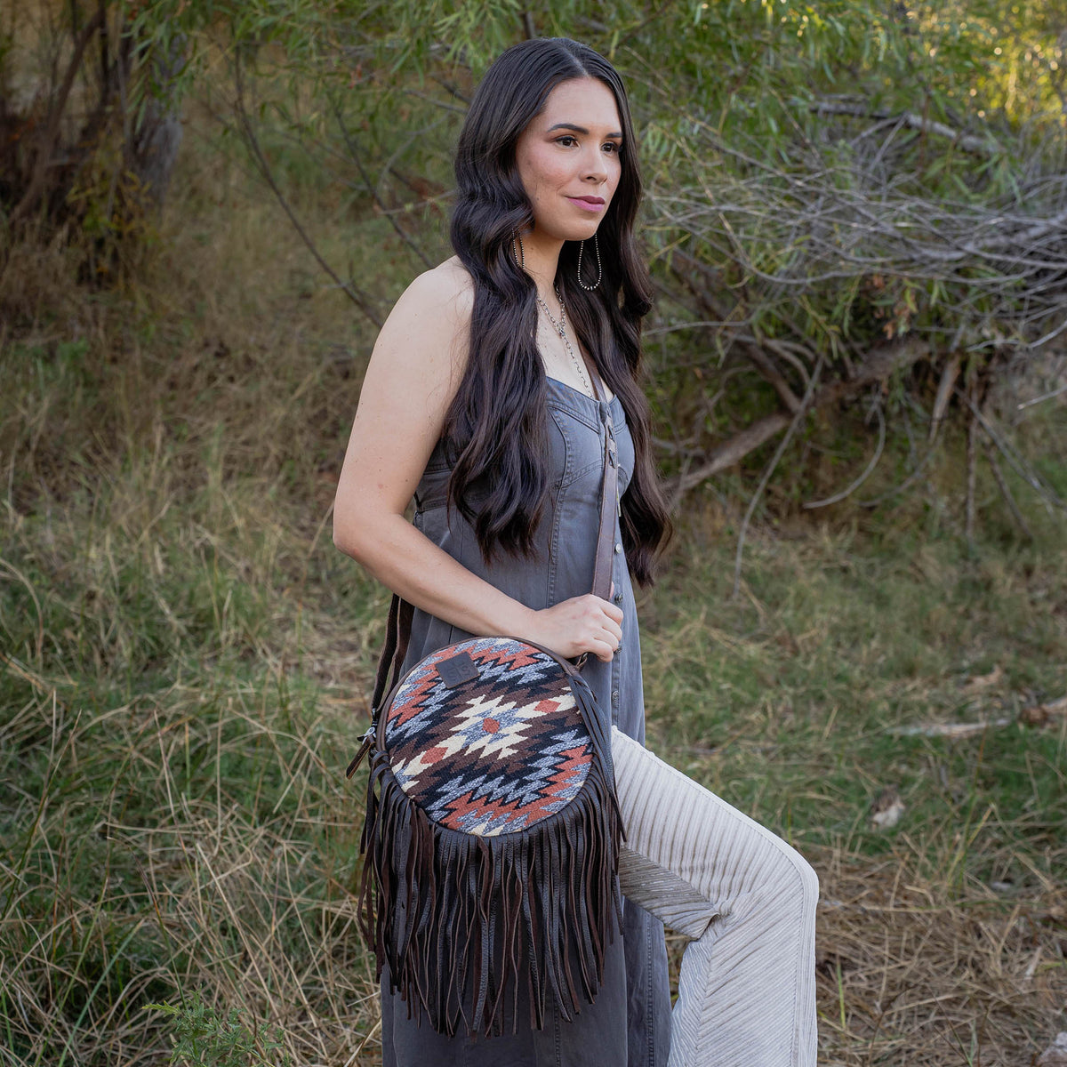 Shawnee Outfitters Guadalupe Serape Sage Crossbody bag with colorful woven fabric and adjustable strap.