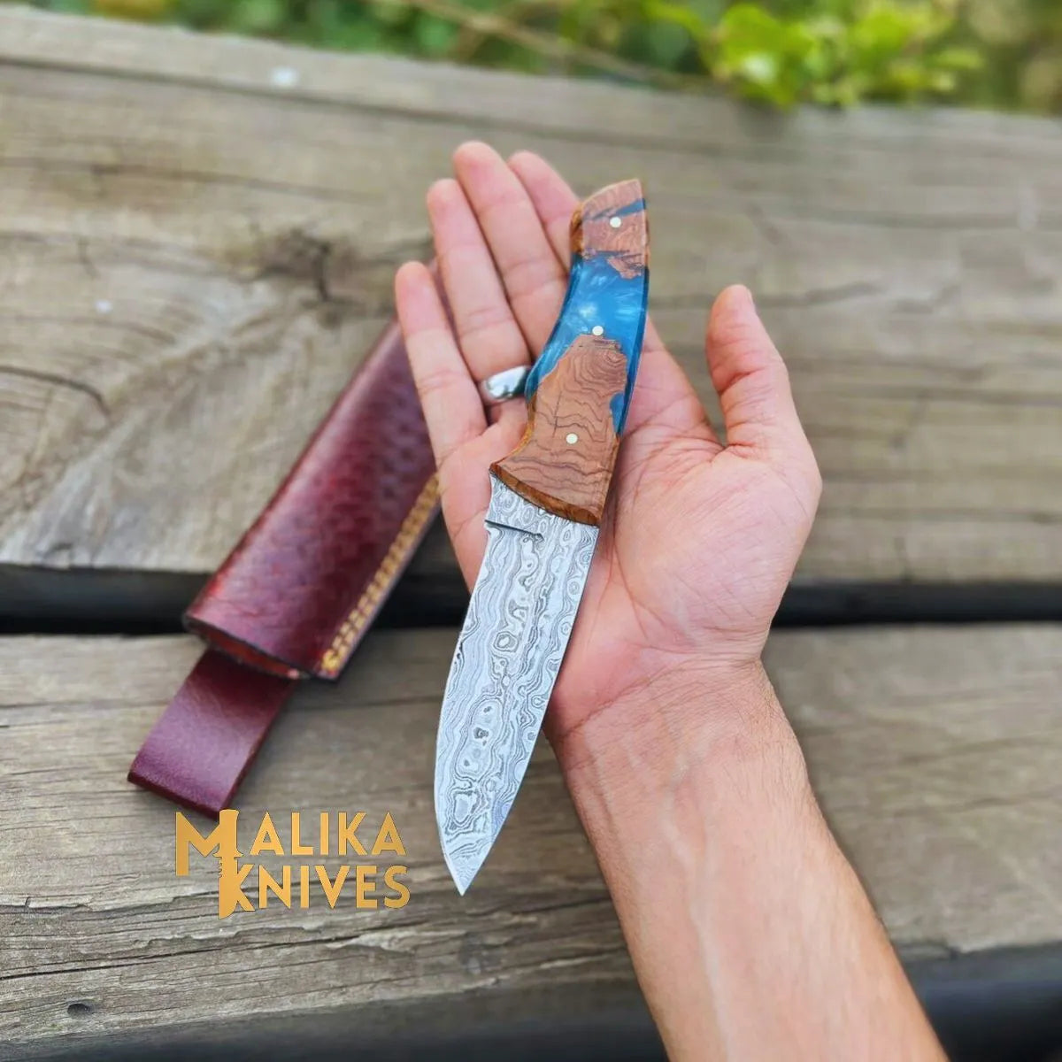 Malika Knives Damascus Steel Skinner Knife with rosewood and resin handle, leather sheath, perfect for outdoor use
