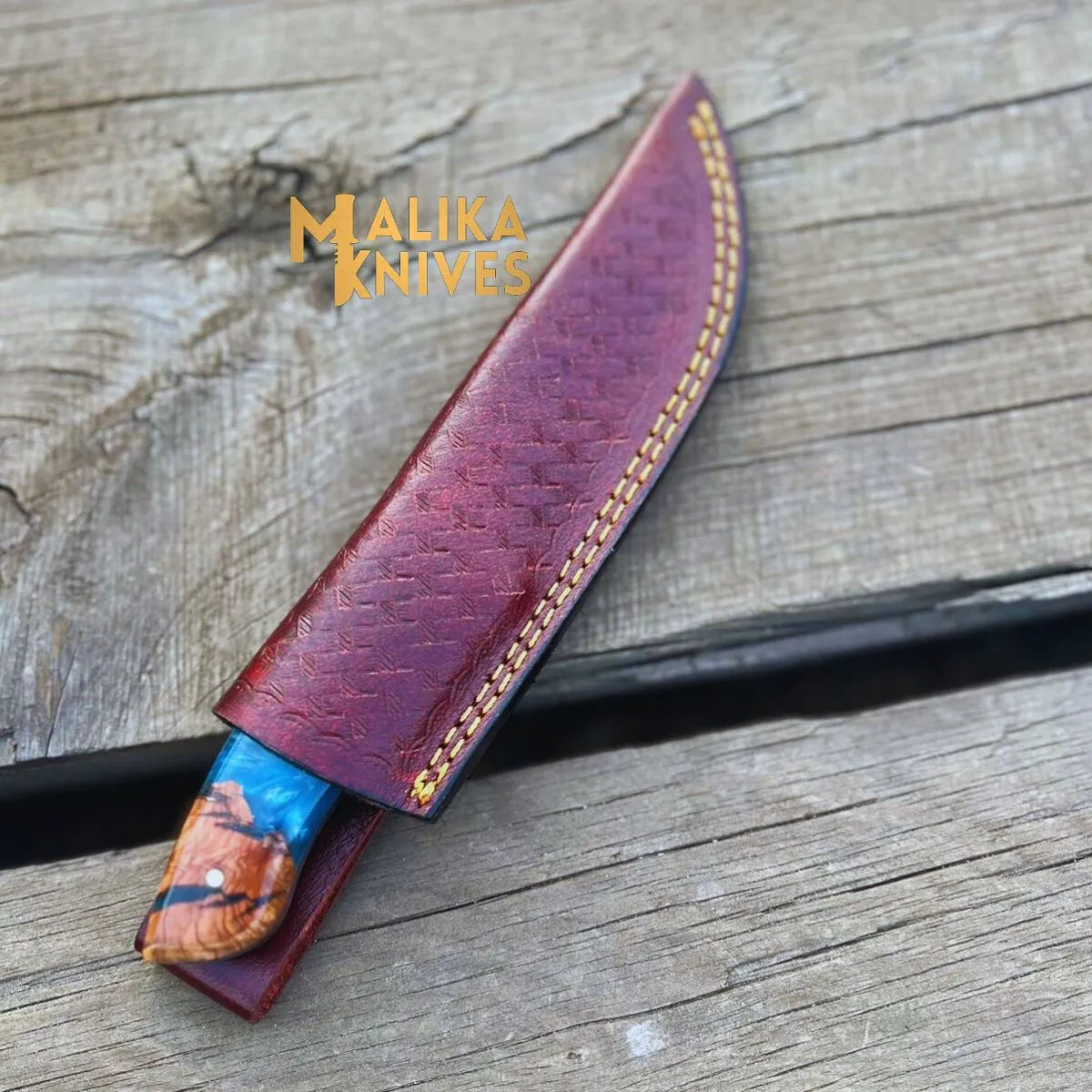 Malika Knives handmade Damascus steel skinner knife with rosewood and resin handle, leather sheath, ideal for outdoor use.