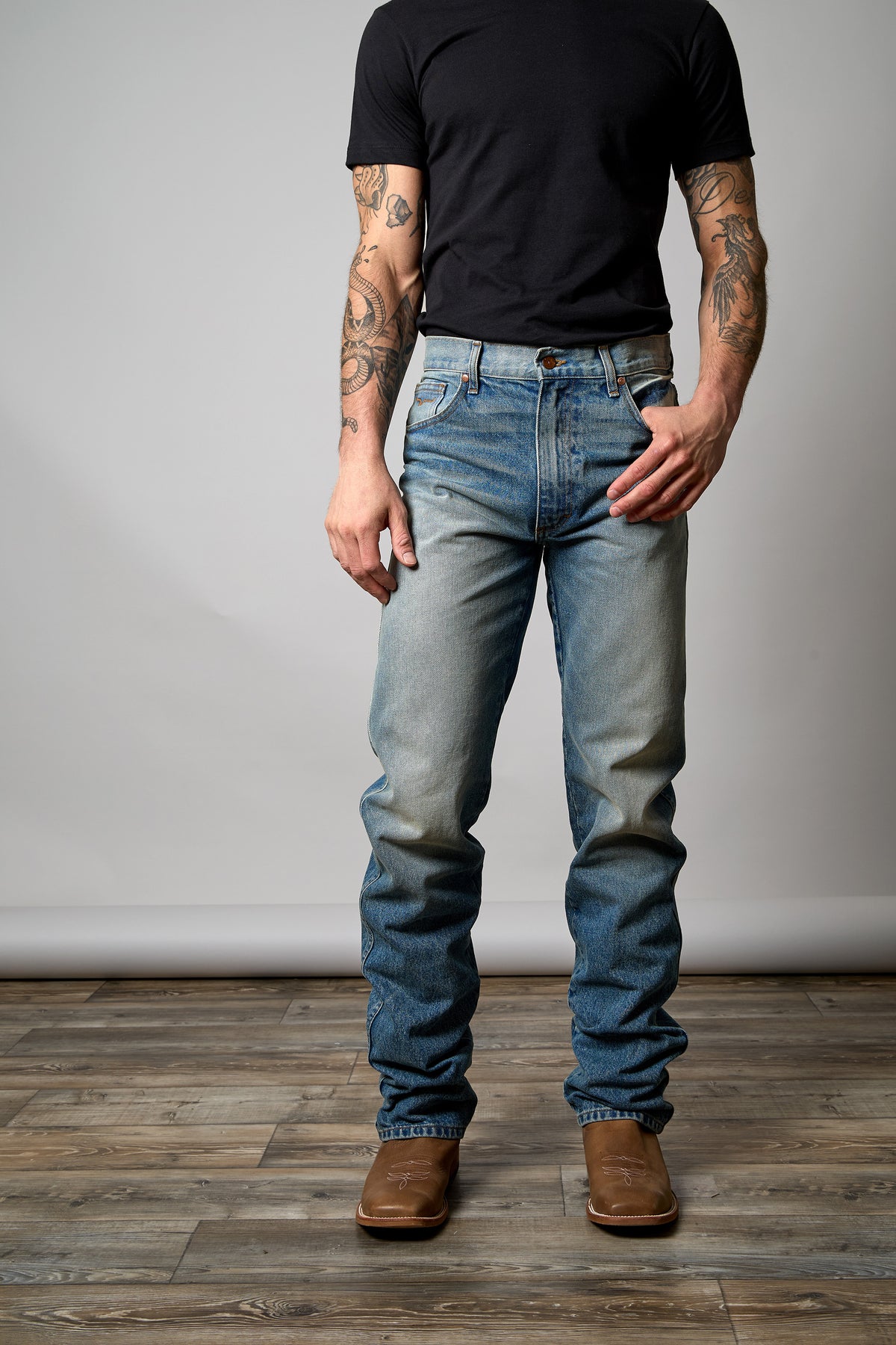 Kimes Ranch Men's ZT Jean in light wash denim, showcasing the classic fit and detailed stitching of these stylish jeans.