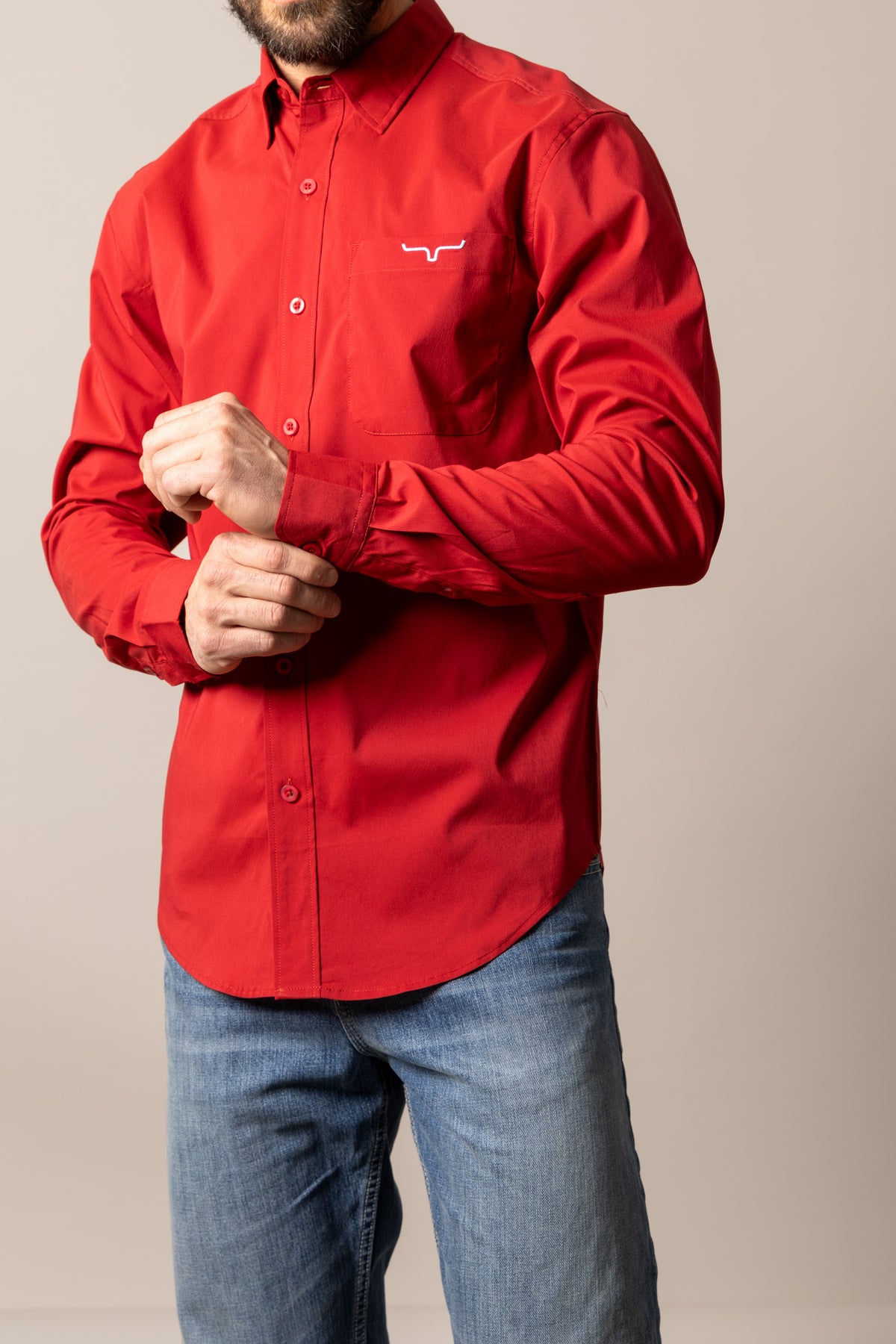 Men's Kimes Ranch Team Dress Shirt in red, featuring a fitted collar and button-down front, ideal for casual or semi-formal wear.