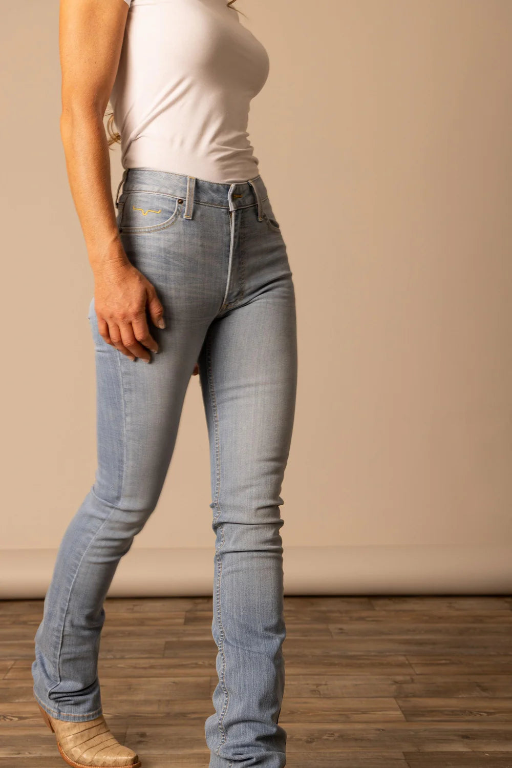Light wash Kimes Ranch Women's Sarah Jeans, stylish and fitted denim with classic five-pocket design, perfect for casual wear.