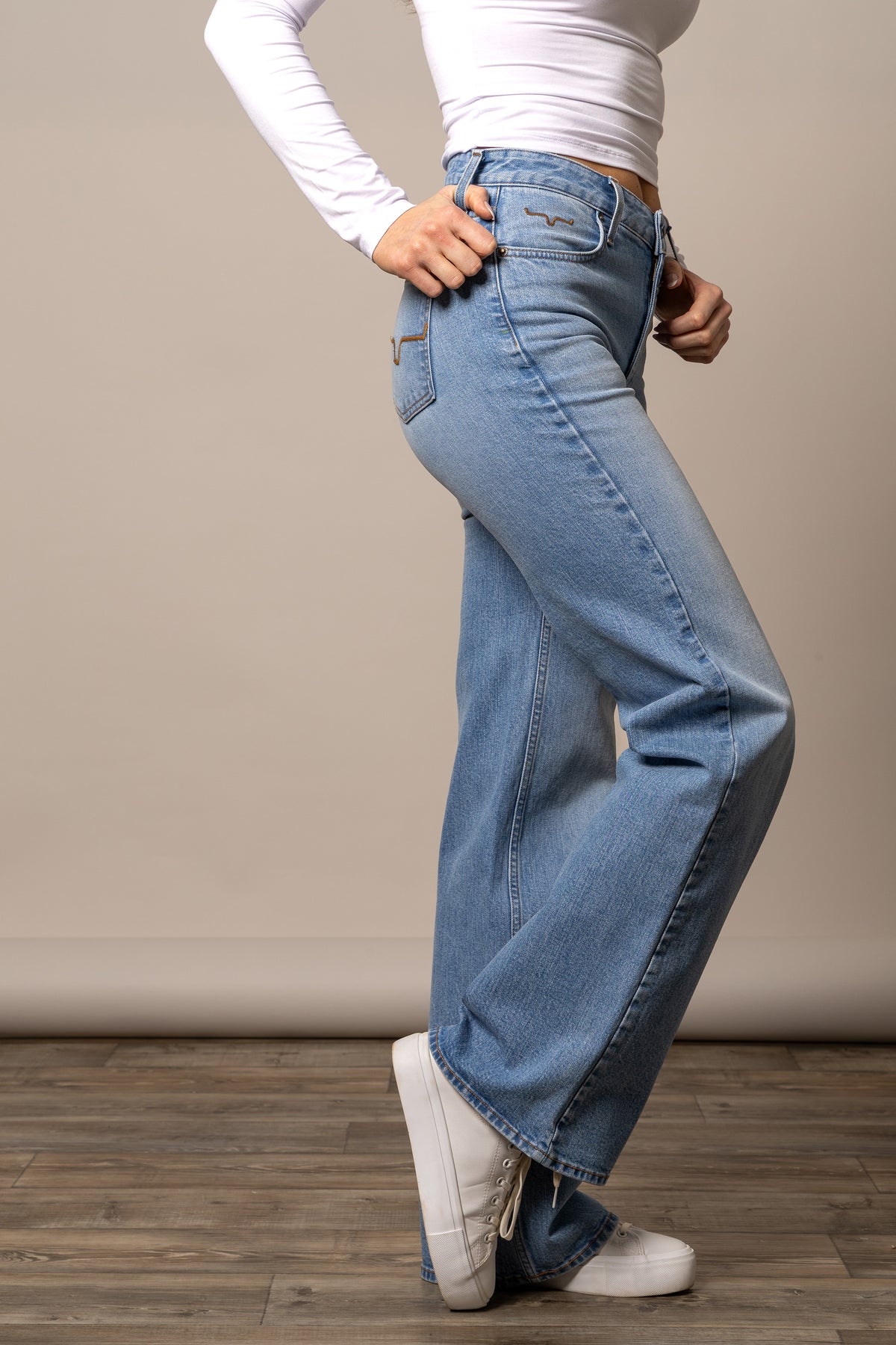Kimes Ranch Women's Zoey Jeans in light wash denim, showcasing a classic fit and stylish design on a model.