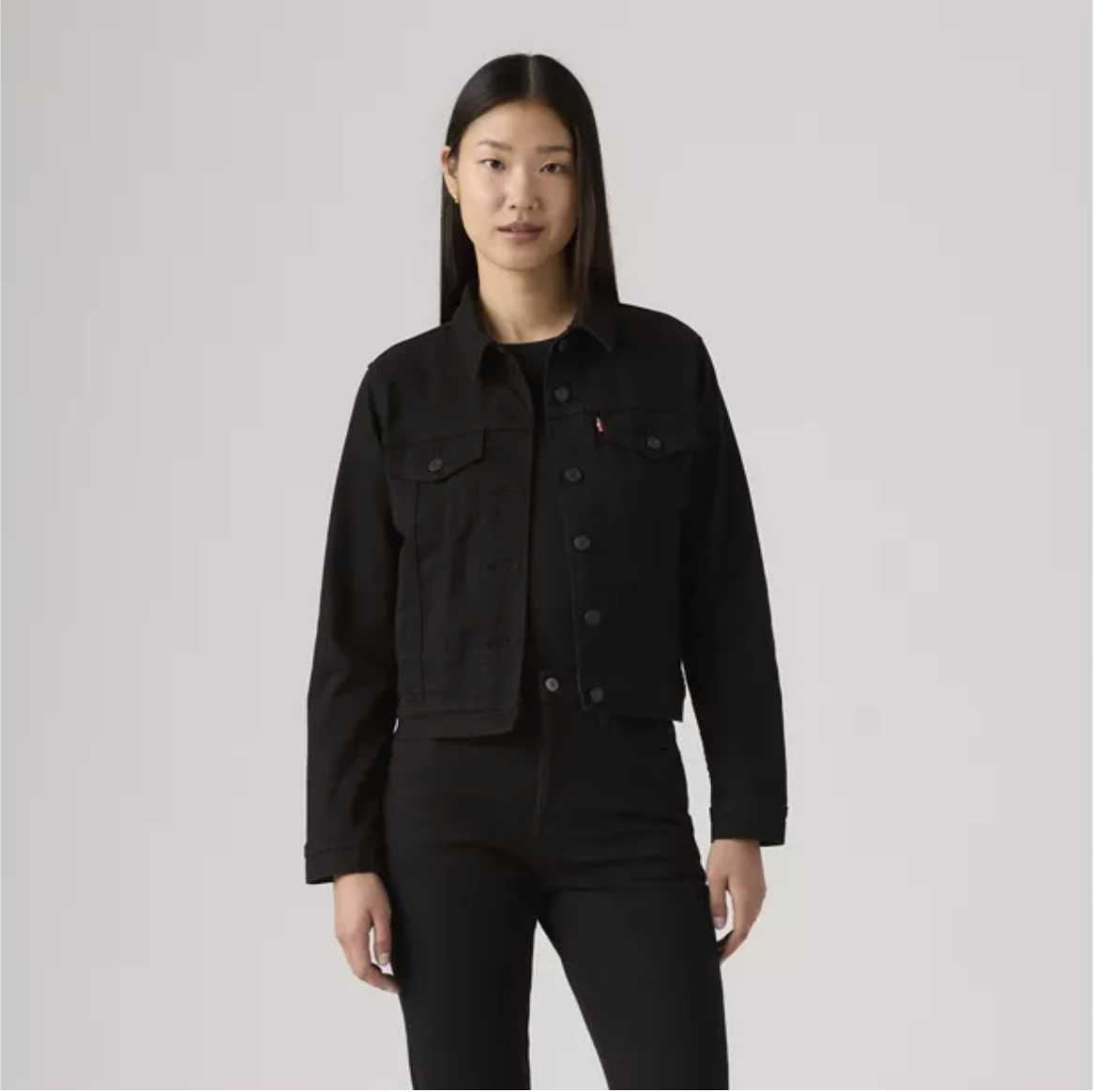 Levi's Women's Original Trucker Jacket in black, casual denim jacket with front pockets and button closure, stylish and timeless.