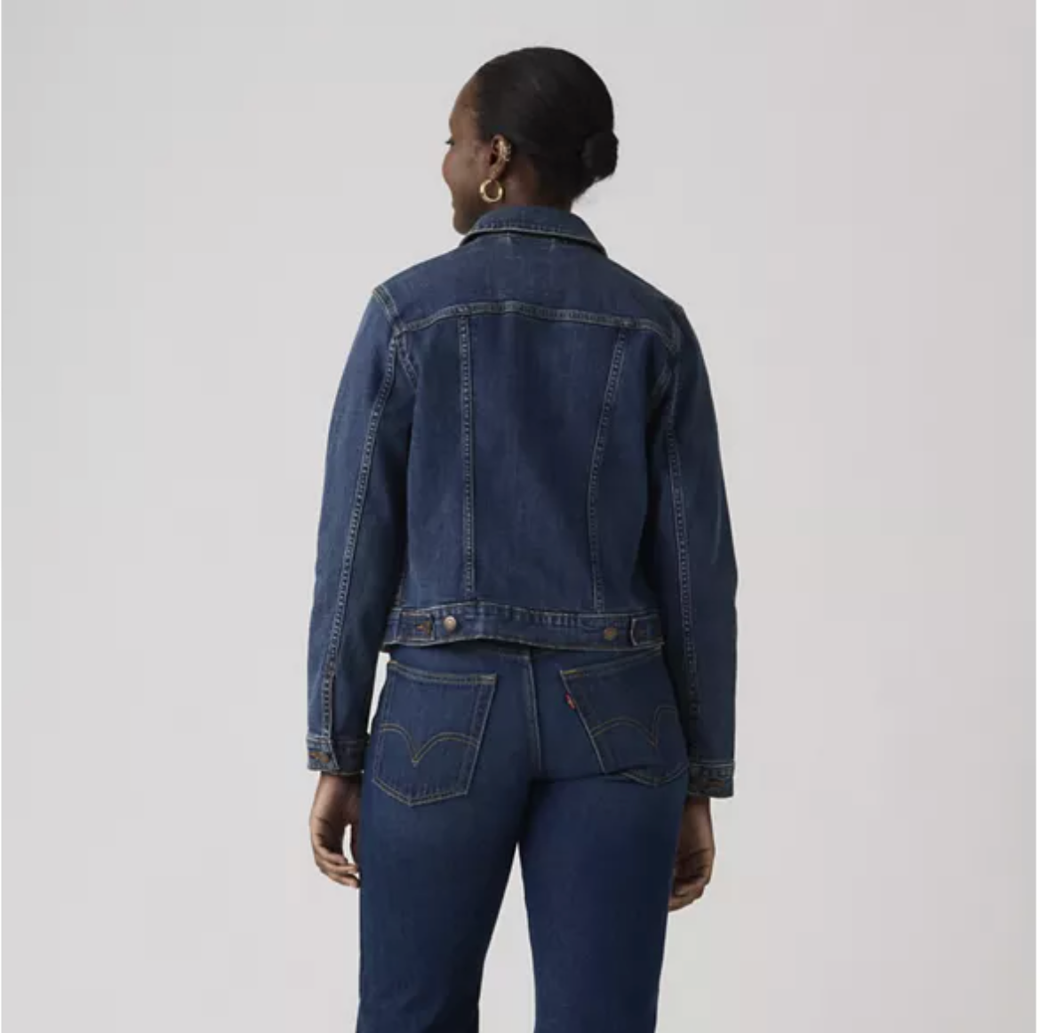 Levi's Women's Original Trucker Jacket in blue denim, casual jacket with button front and classic fit.