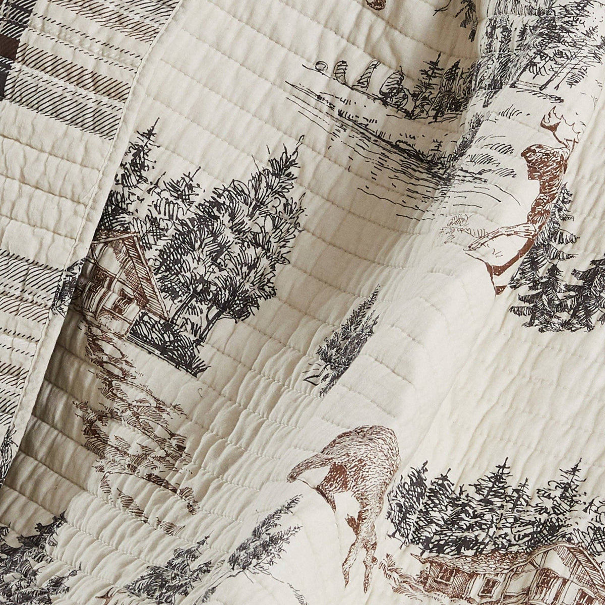 Levtex Home Lodge Toile quilted throw blanket with rustic toile pattern and soft fabric for cozy comfort.