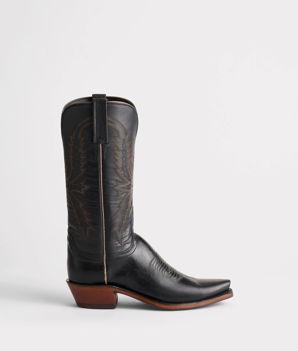 Black Lucchese Savannah women's cowboy boots with intricate stitching and pointed toes, showcasing Western leather craftsmanship.