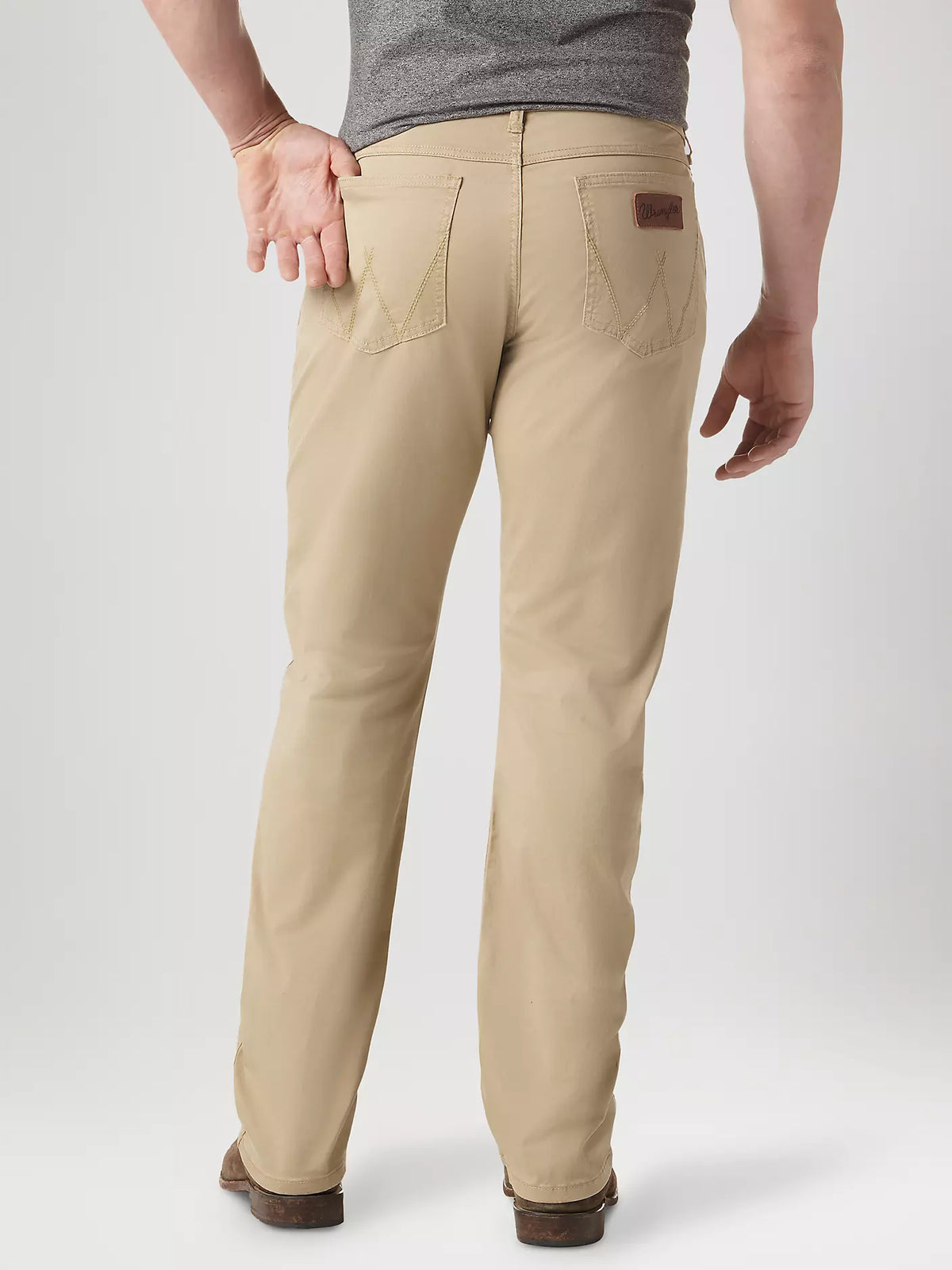 Men's Wrangler Retro slim fit straight leg pants in fawn color, casual denim-style pants for versatile everyday wear.