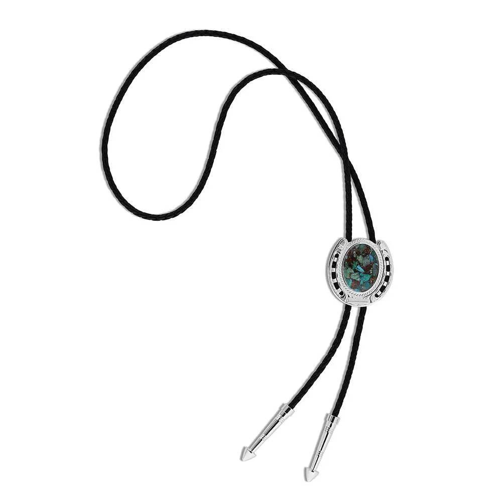 Montana Silversmiths The Pioneer's turquoise bolo tie with silver-tone accents and braided leather cord.