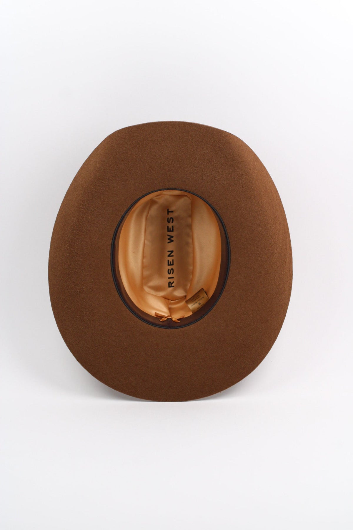 Wilder and Soul Mustang in caramel color, showcasing sleek design and luxurious leather upholstery.