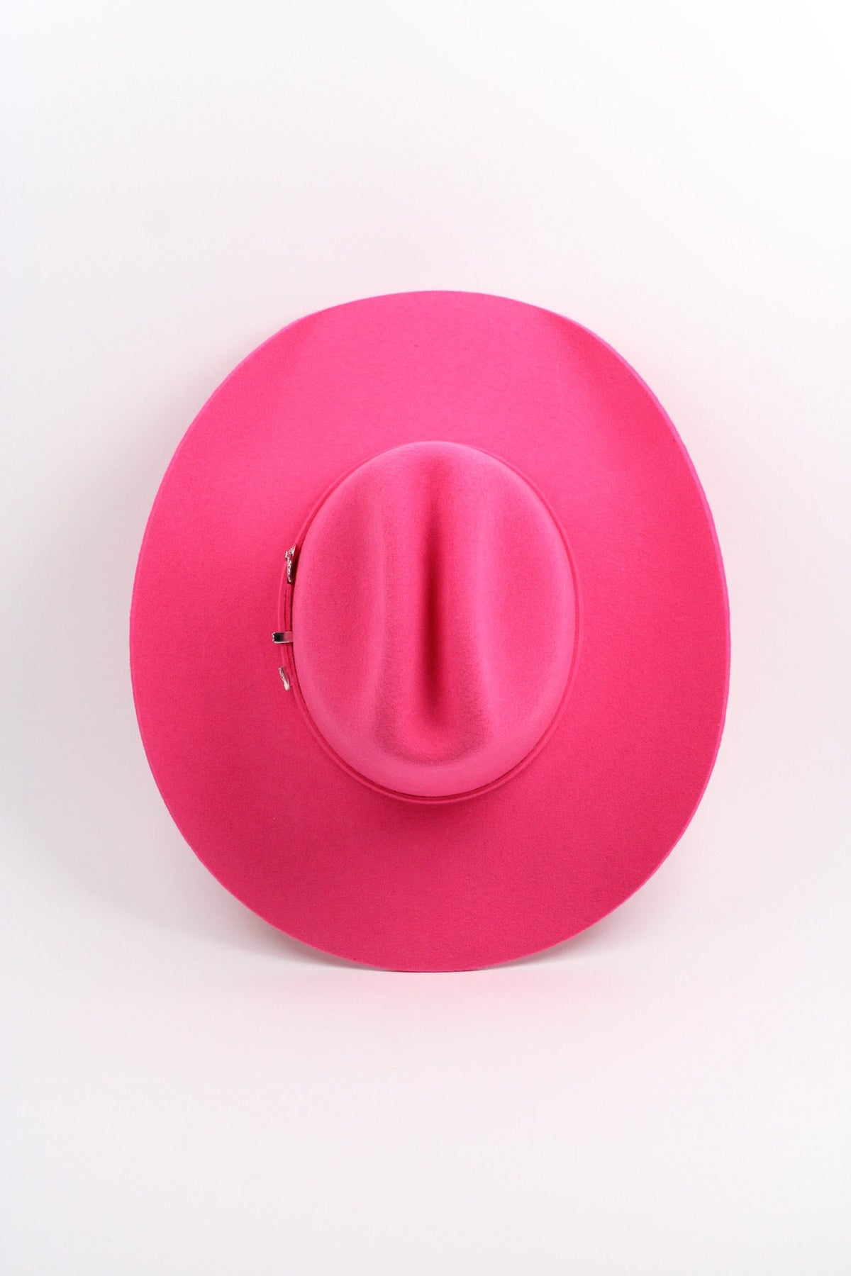 Pink Mustang by Wilder and Soul featuring a vibrant pink design and sleek, modern styling for a fashionable look.