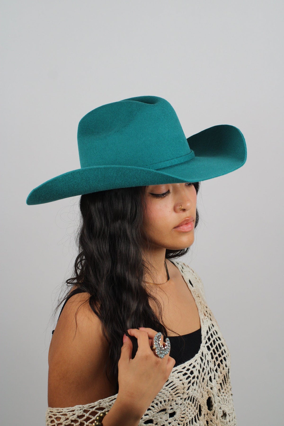 Wilder and Soul Mustang in vibrant turquoise, showcasing detailed craftsmanship and stylish design.