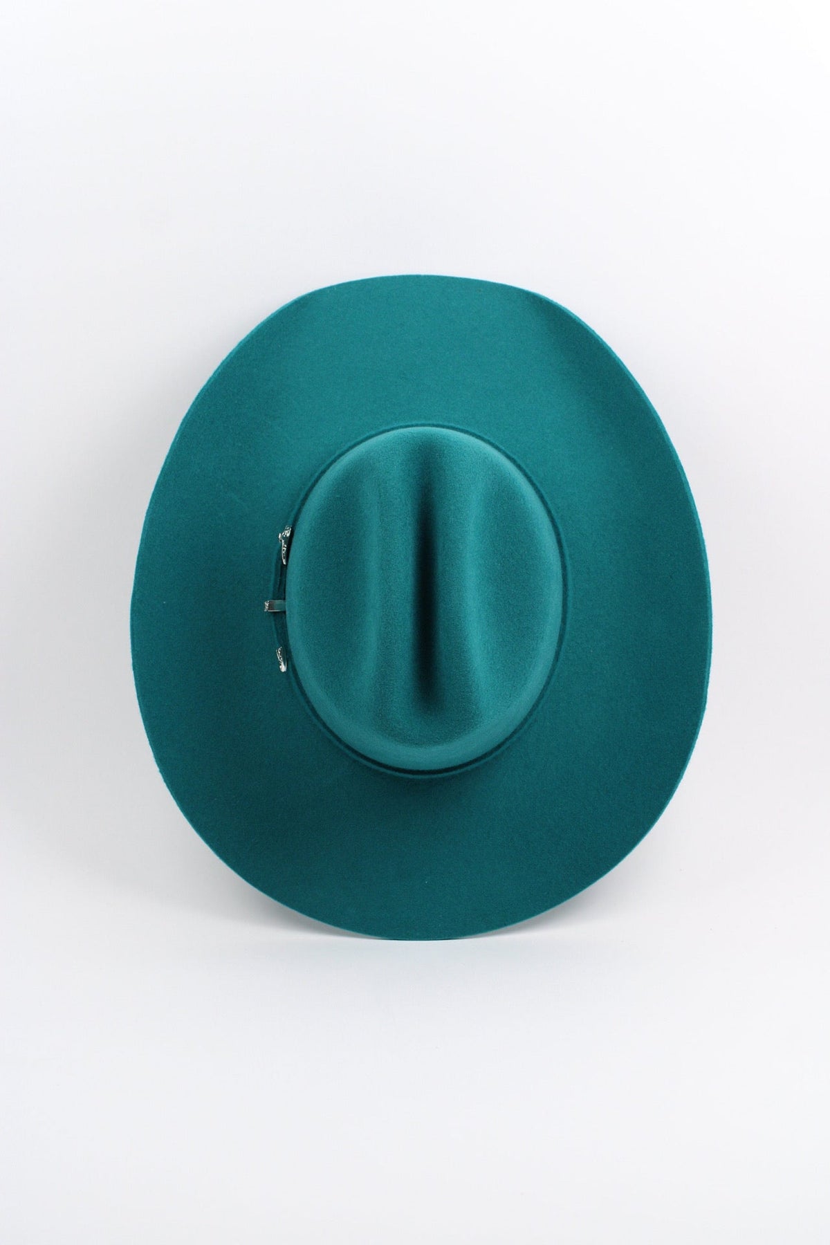 Wilder and Soul Mustang in turquoise color, featuring a sleek design and vibrant finish, displayed on a plain background.