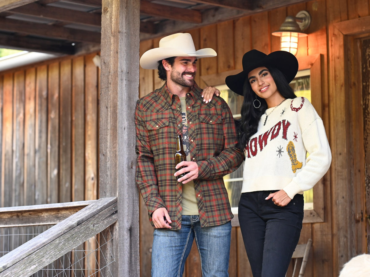 Rock & Roll Denim couple on a cabin porch