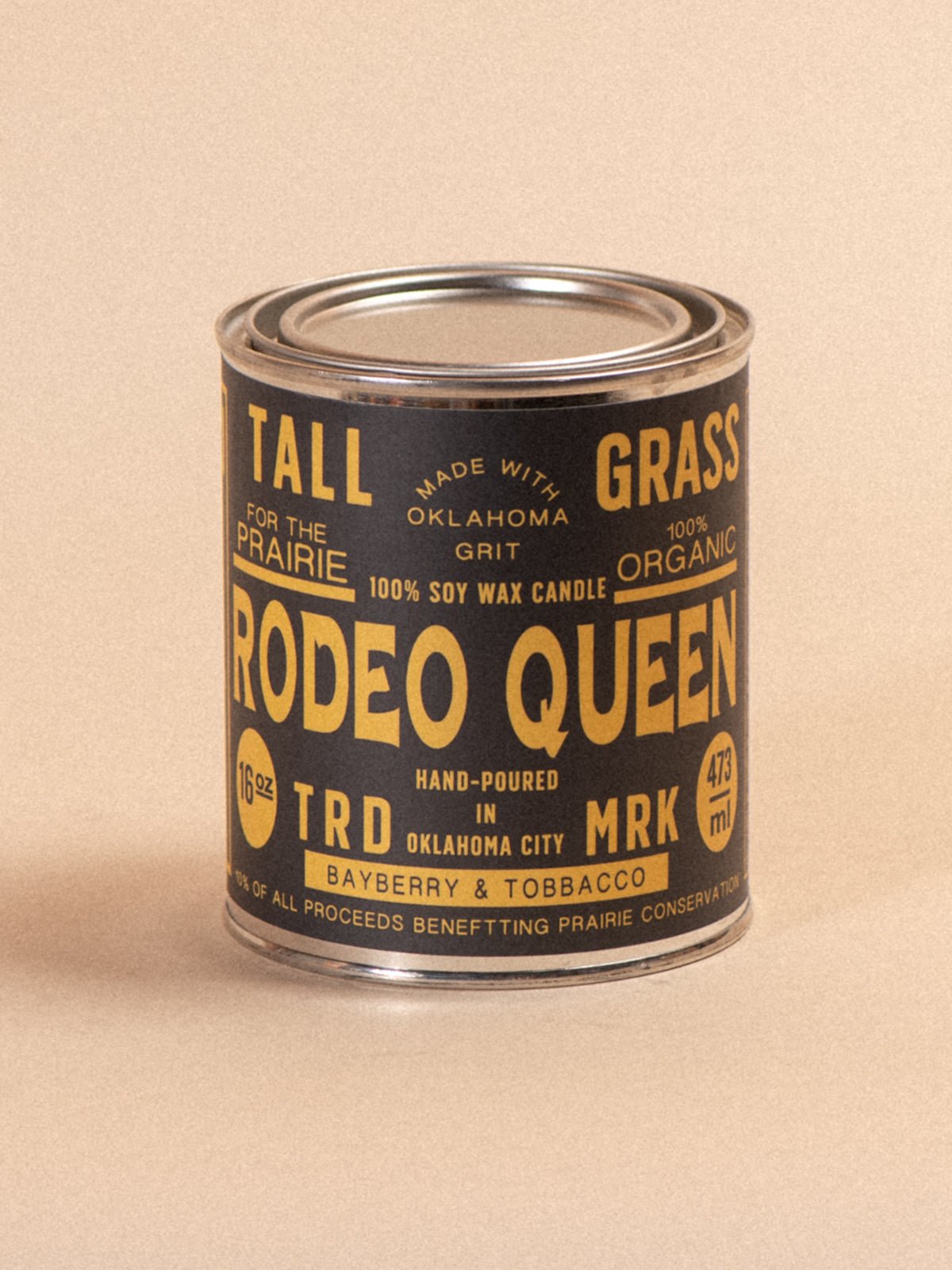 Tallgrass Supply Rodeo Queen soy wax candle featuring Bayberry and Tobacco scents, in a decorative candle jar.