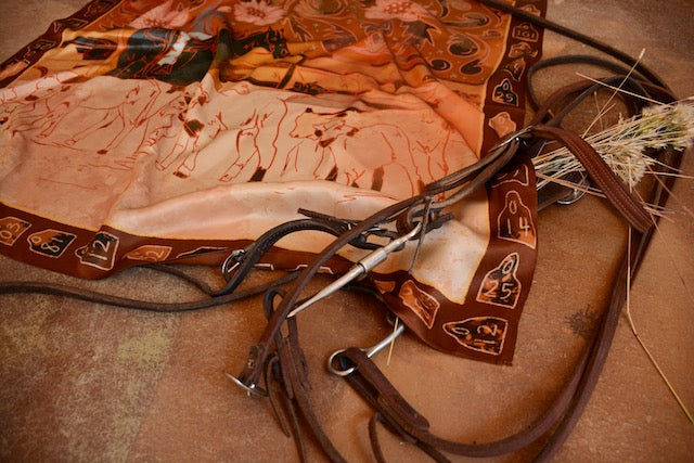 Tirzah Lane Art floral cowgirl bandana, 35x35 inches, made of 100% Mulberry silk with Western and wild cowgirl design.