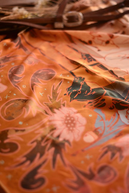 Tirzah Lane Art large 35x35 silk bandana with floral cattle and cowgirl Western design, 100% mulberry silk, round-up style.