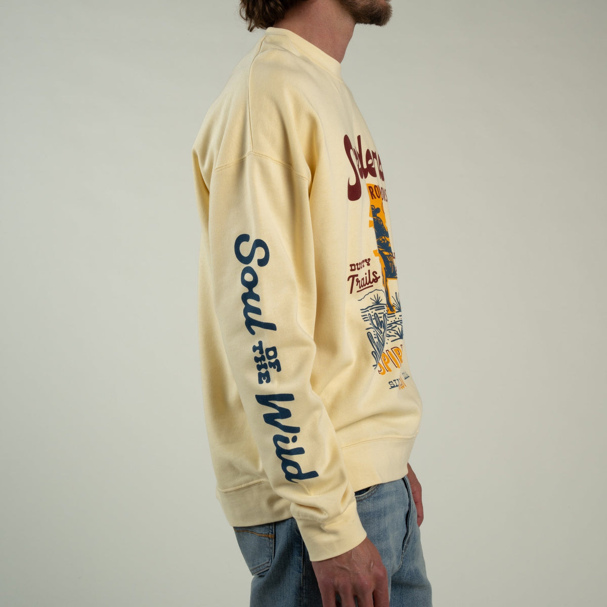 Sendero Provisions Co. Men's Dusty Trails Sweatshirt, Cream – left sleeve detail