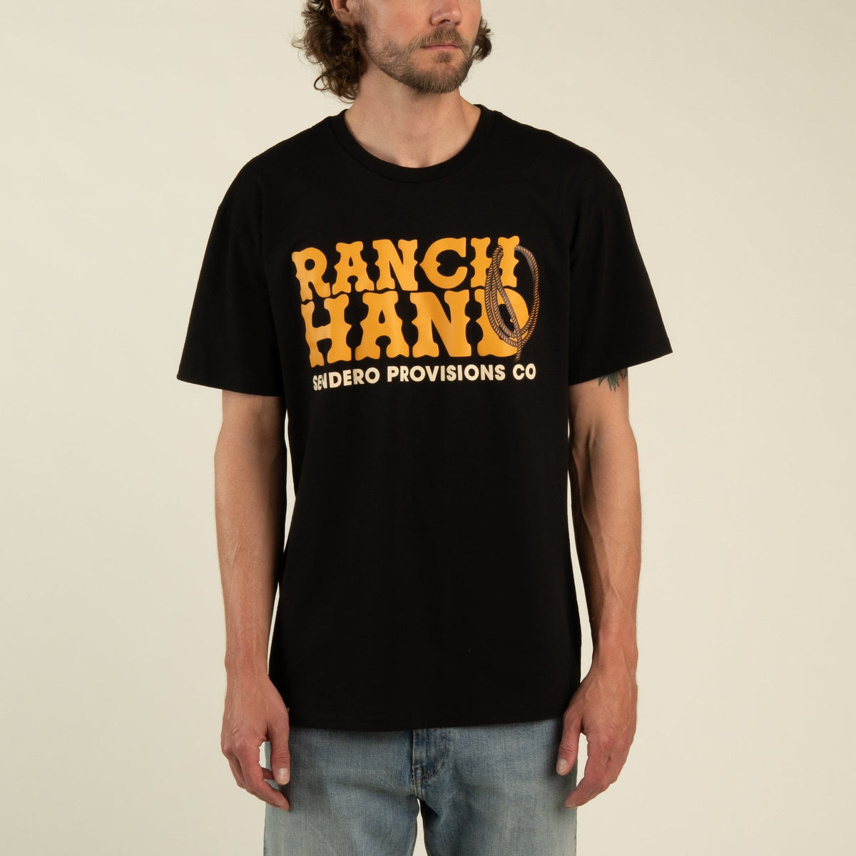 Sendero Provisions Co. Men's Ranch Hand Vintage T-Shirt, Black – model front