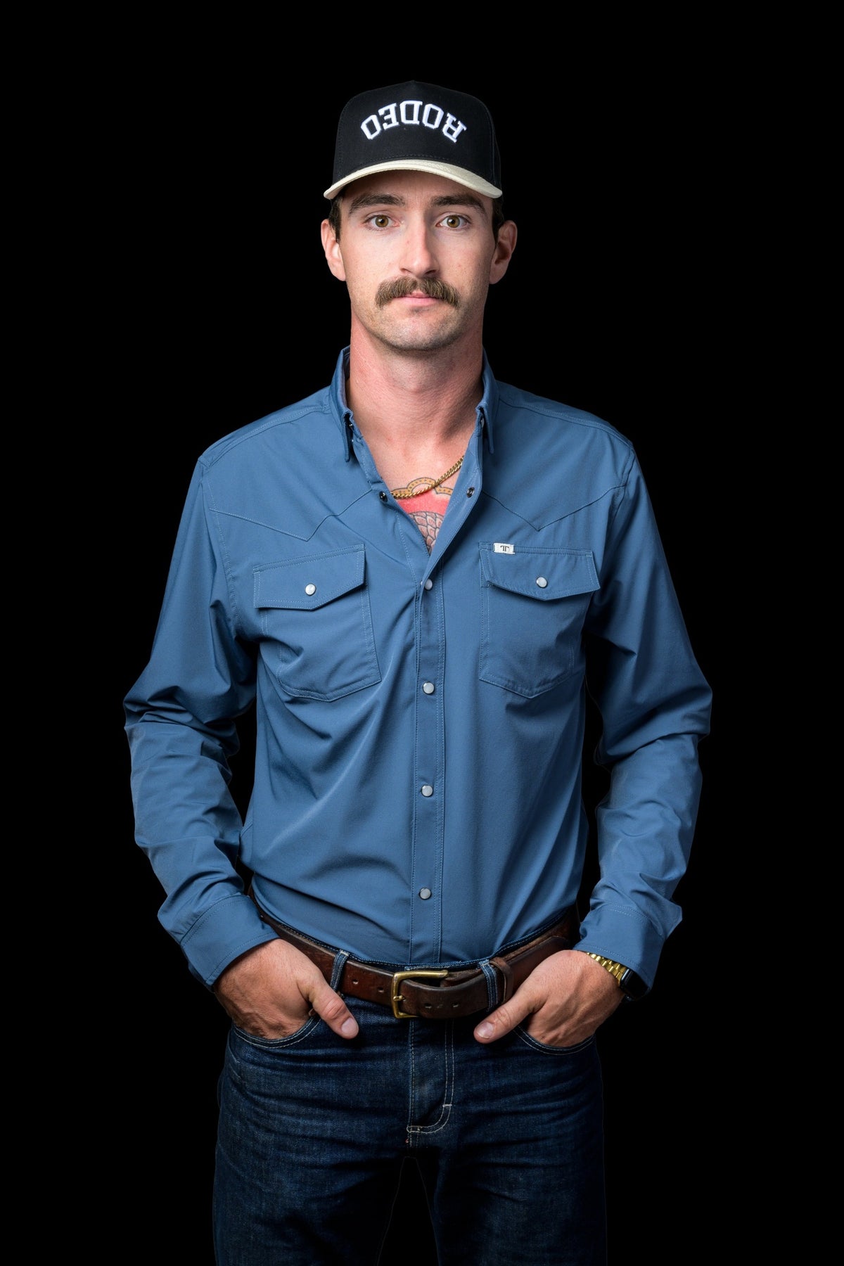 Ferrell Brand Men's Core Pearl Snap Long Sleeve Shirt, Blue – front on model