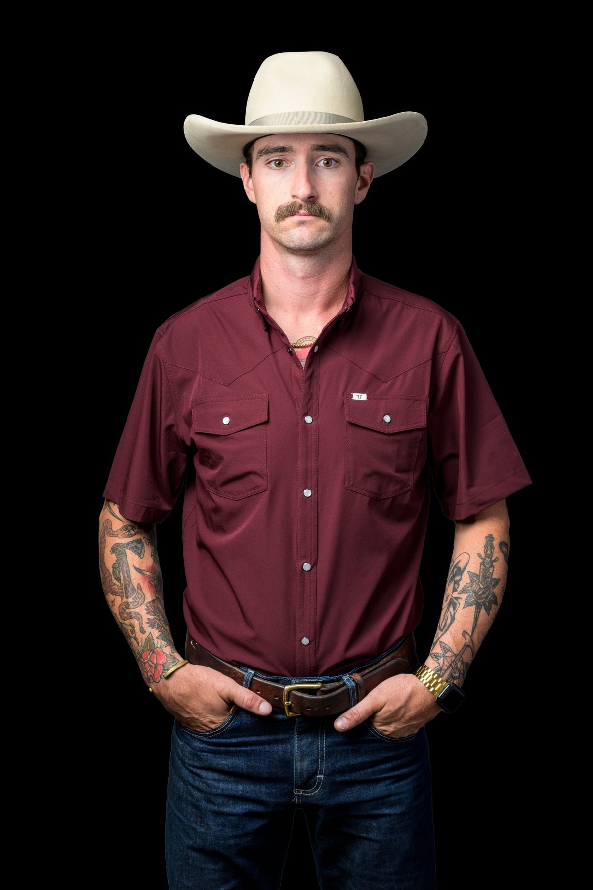 Ferrell Brand Men's Core Pearl Snap Short Sleeve Shirt, Maroon – front on model