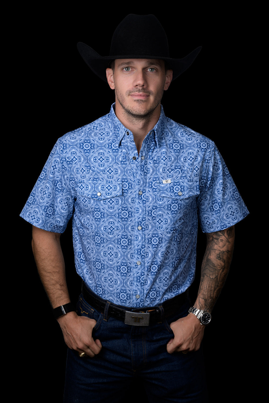 Ferrell Brand Men's Levi Pearl Snap Short Sleeve Shirt, Blue – front on model