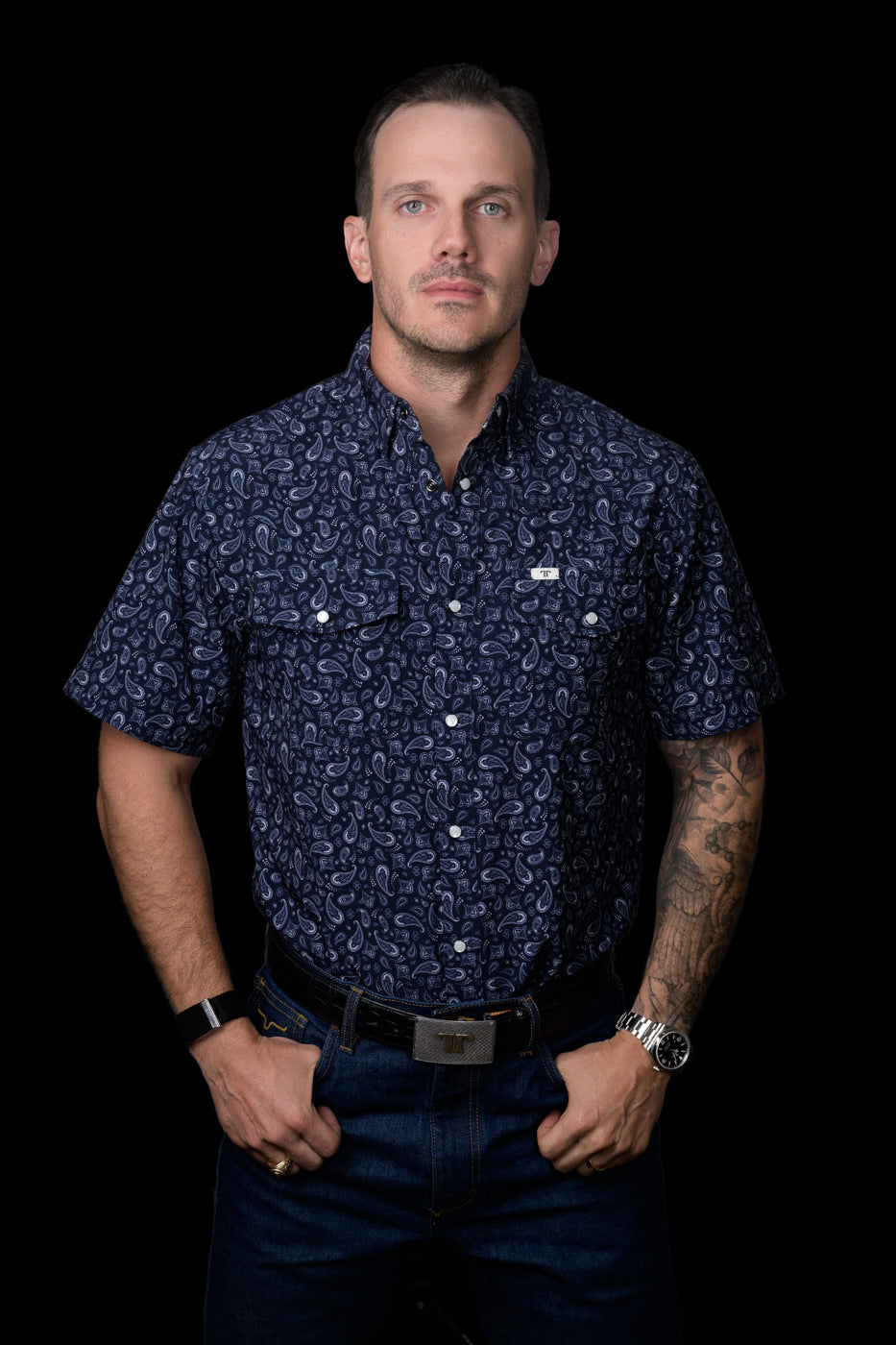 Ferrell Brand Men's Rio Pearl Snap Short Sleeve Shirt, Navy – front on model