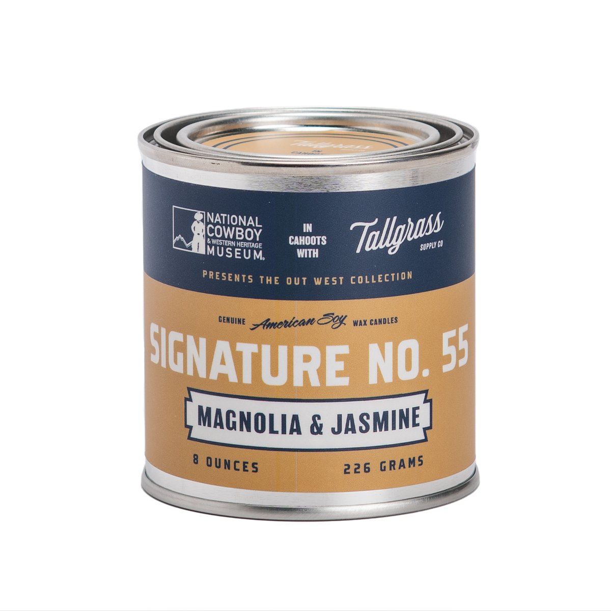 Tallgrass Supply Signature No. 55 soy wax candle with magnolia and jasmine floral scent in a clear glass jar.