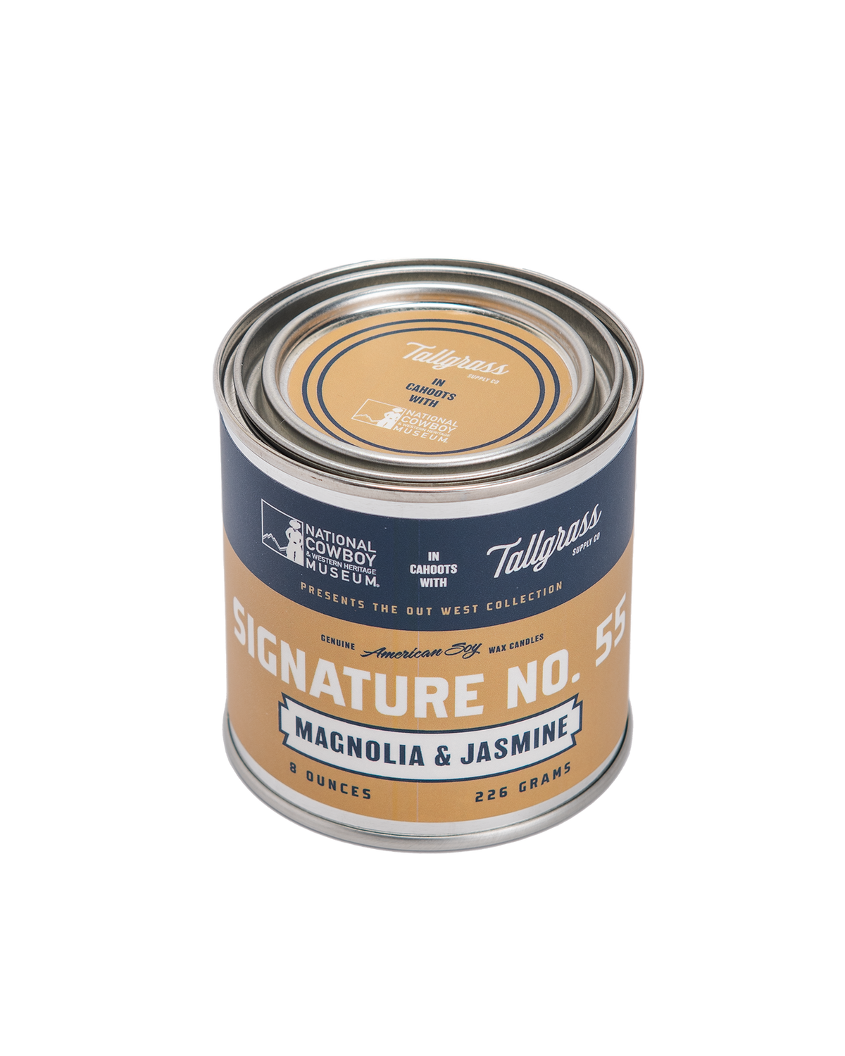 Tallgrass Supply Signature No. 55 Magnolia and Jasmine soy wax candle in a glass jar with a wooden lid, showcasing fresh floral scent.