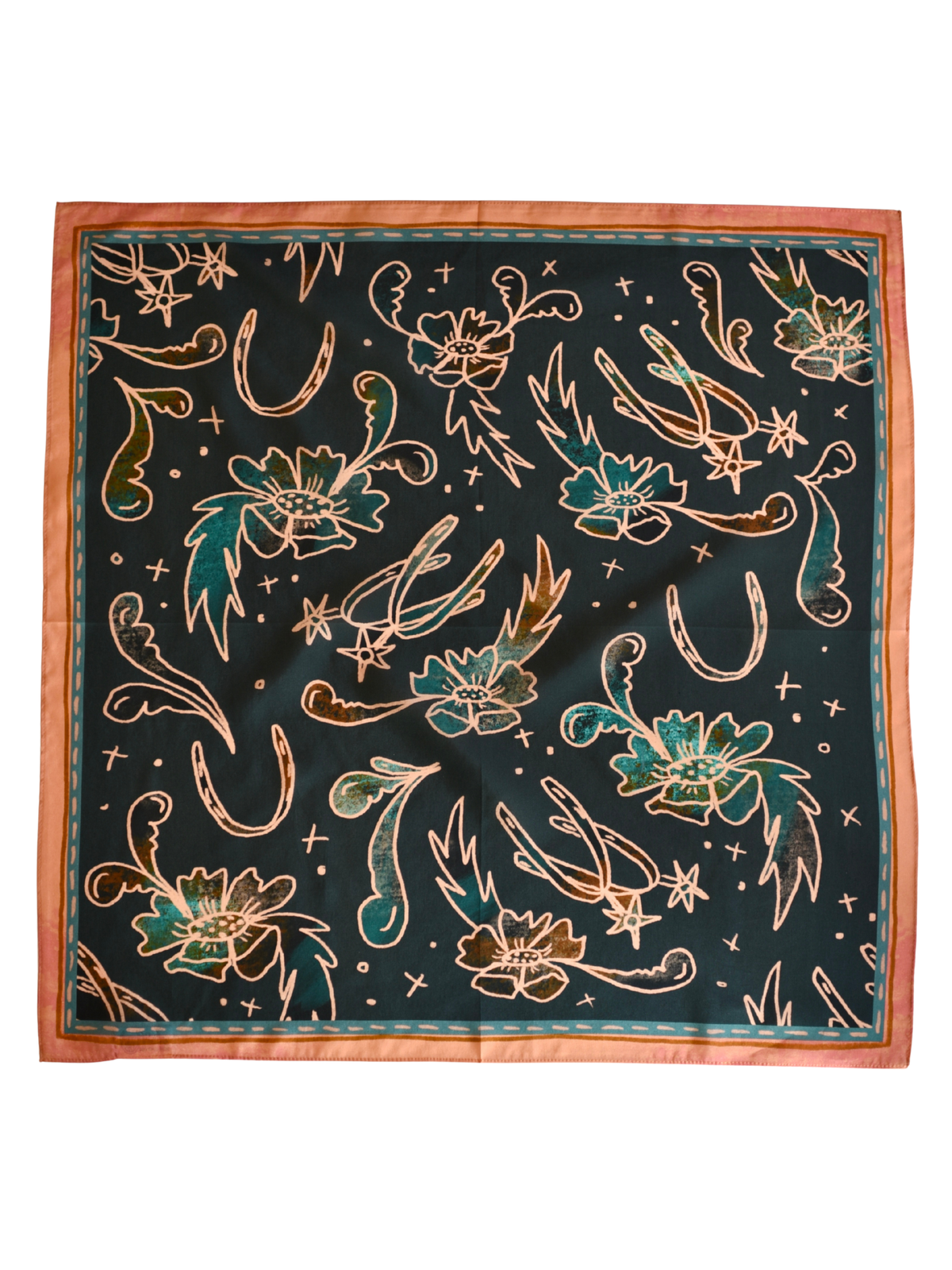 Tirzah Lane Art Western silk wild rag scarf with floral turquoise and peach patterns, paired with decorative spurs.