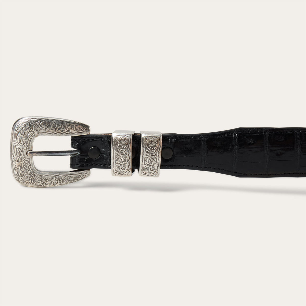 Black Stetson Caiman Tapered Belt by Gem Dandy, showcasing its textured leather strap and tapered design.