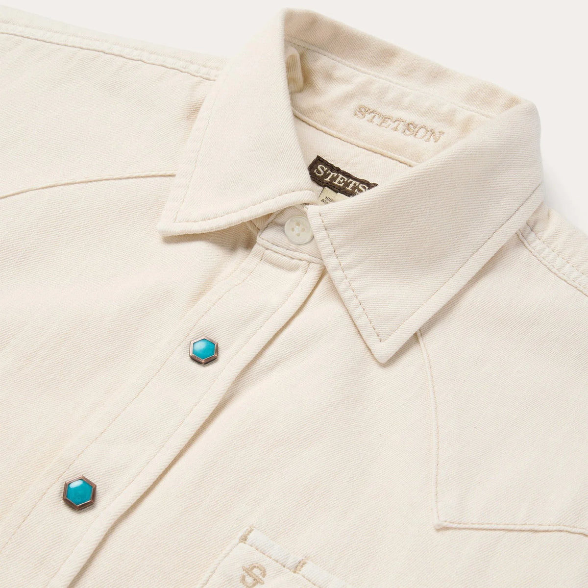 Stetson men's turquoise snap western denim shirt with button details and classic western style, shown on a hanger.