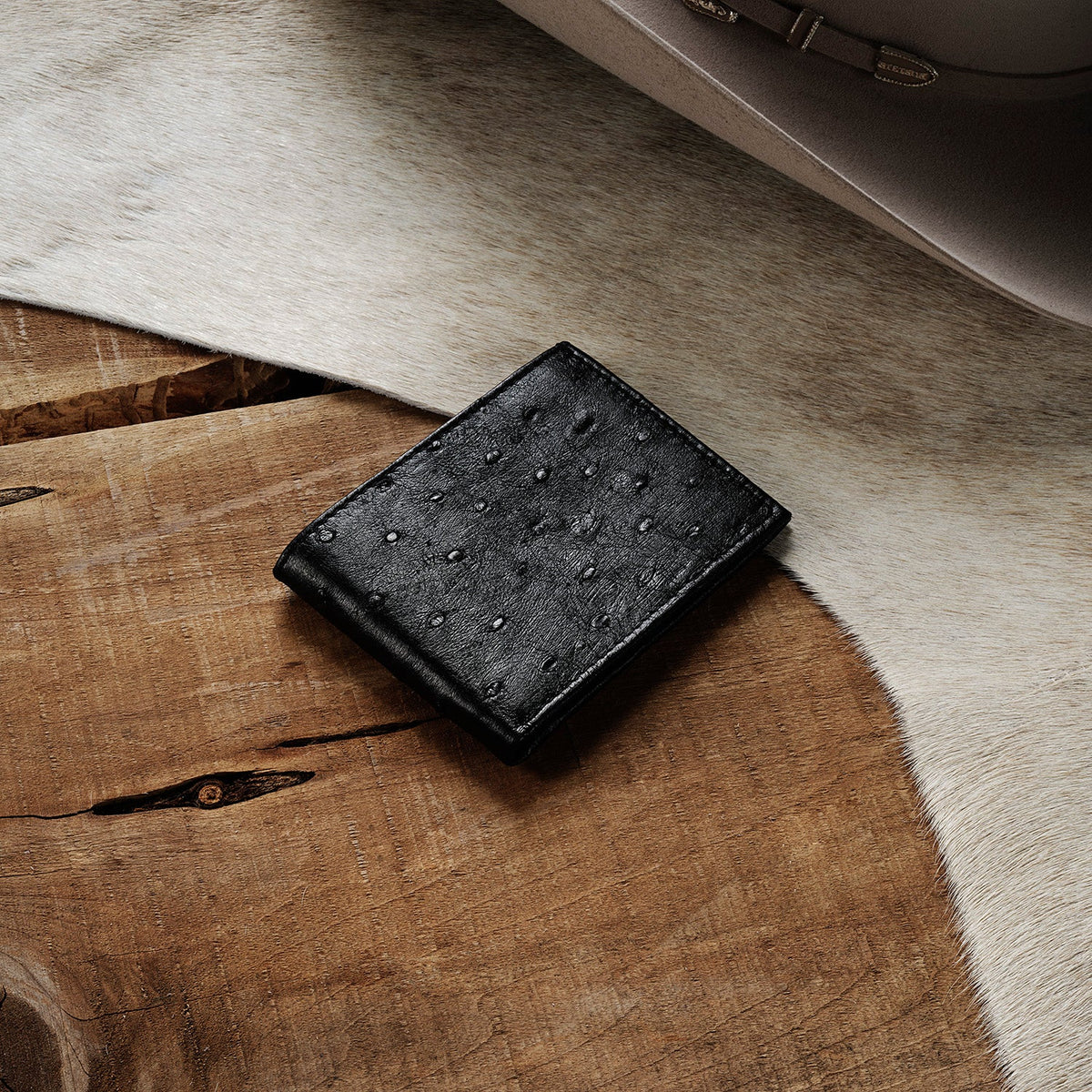 Stetson Ostrich Bi-Fold Wallet by Gem Dandy showing textured ostrich leather and multiple card slots.