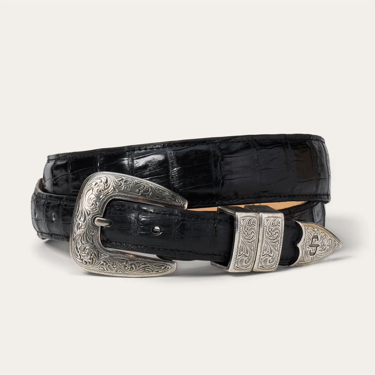 Stetson Women's black Caiman leather tapered tab belt with classic design and metal buckle, stylish accessory for women.