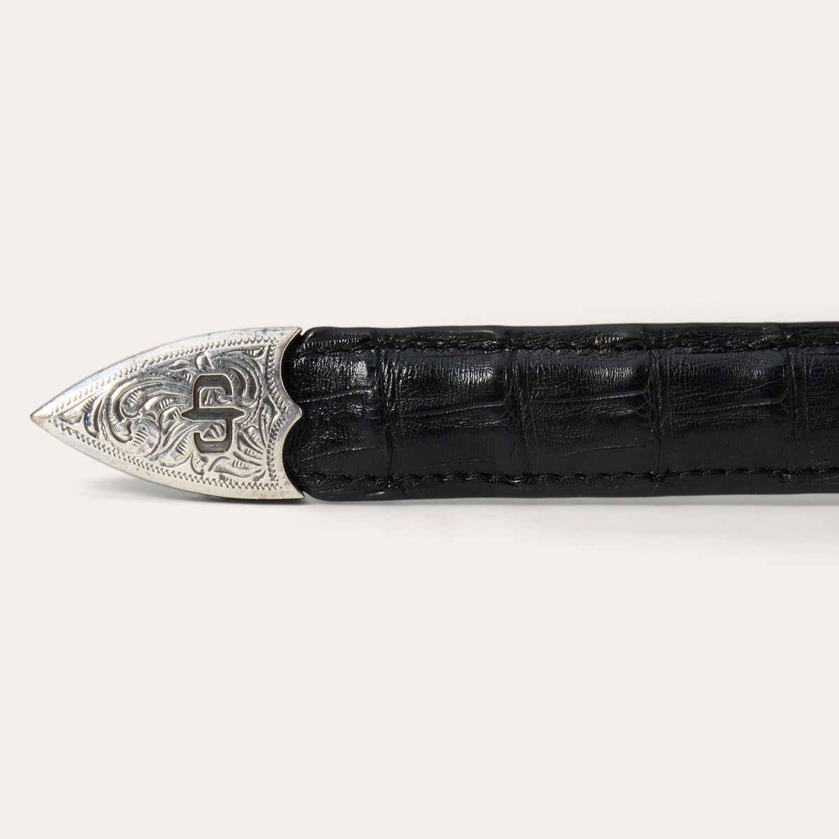 Black Stetson women's Caiman leather tapered tab belt with classic style and silver buckle, perfect for casual or dress outfits.
