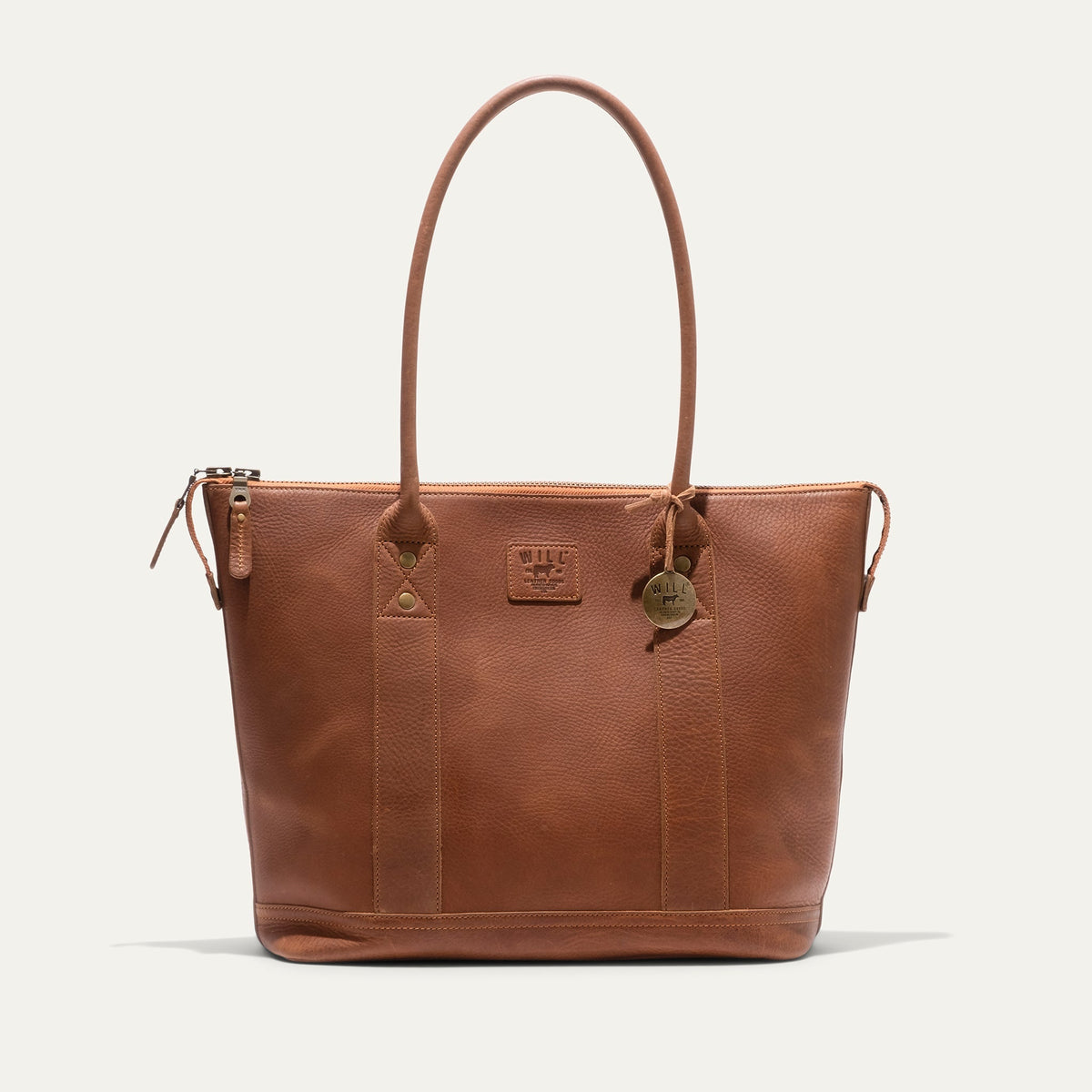 Will Leather Goods Twenty Four Seven Leather Tote bag with sturdy handles and spacious interior, showcasing classic craftsmanship.