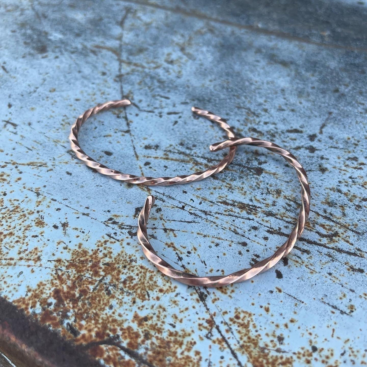 Handmade unisex twisted silver cuff bracelet by Boles Silver featuring a sleek, textured design for stylish jewelry wear.