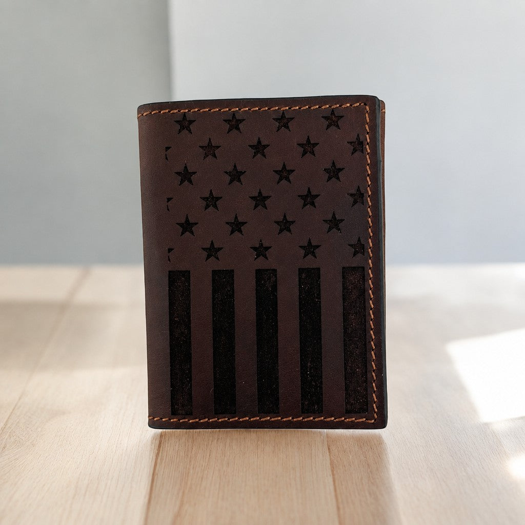 Twisted X brown leather bifold wallet with a debossed American flag on the front panel