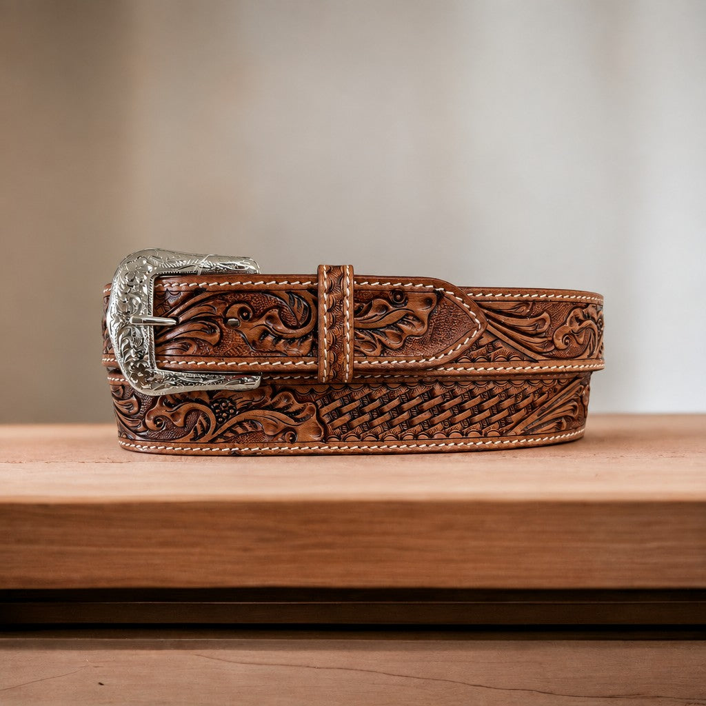 Twisted X men's medium brown full grain leather belt with all-over floral and basket weave tooling and an antique silver buckle