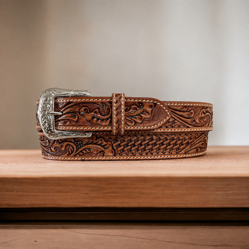 Twisted X men's medium brown full grain leather belt with all-over floral and basket weave tooling and an antique silver buckle