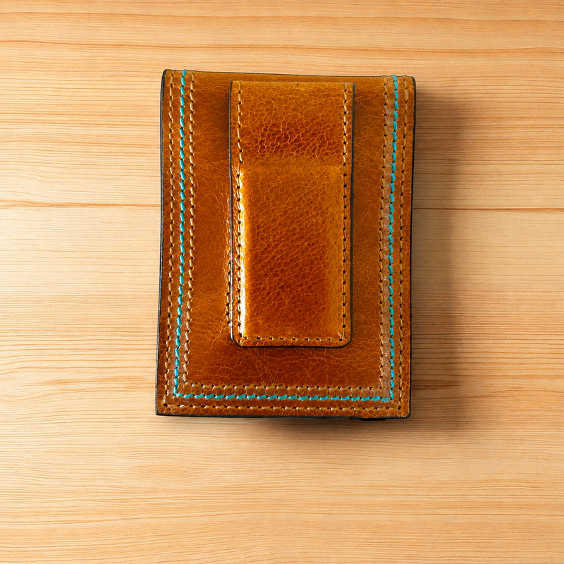Twisted X tan leather money clip card holder with a leather covered money clip and turquoise stitching