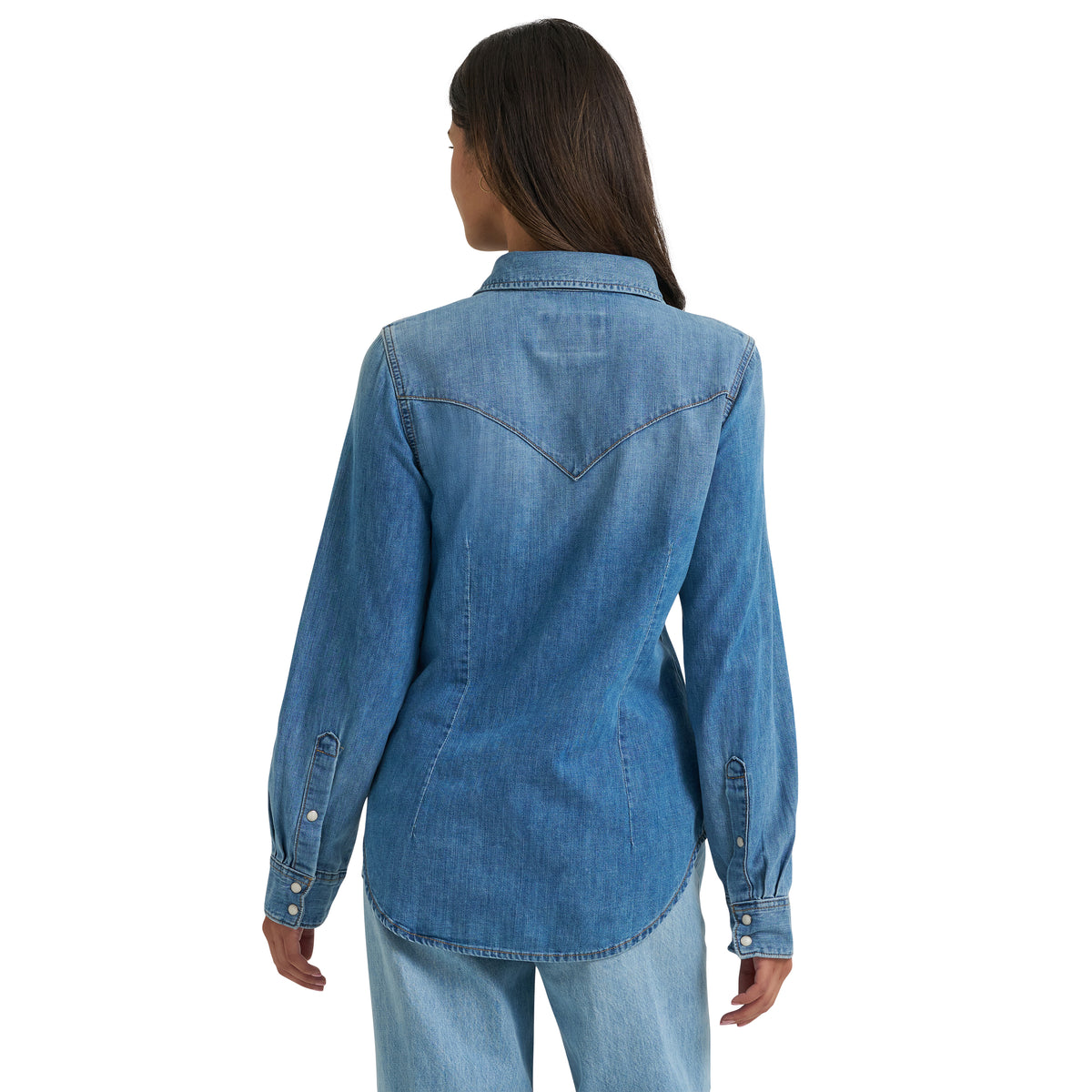 Women’s Wrangler Iconic Western Denim Snap Shirt in light denim, featuring classic Western styling and button snap closures.