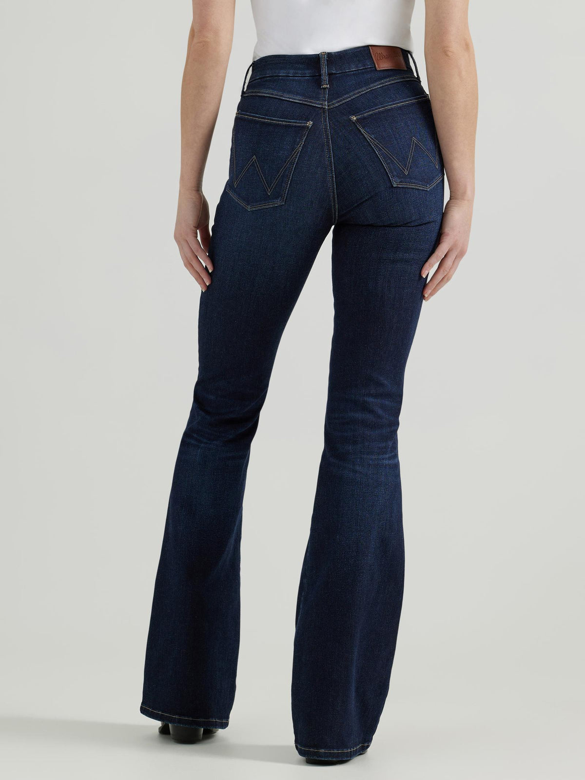 Wrangler Women's® Bespoke Flare Jean in high-rise Madilyn style, featuring a classic denim look with a fitted waist and flared leg.