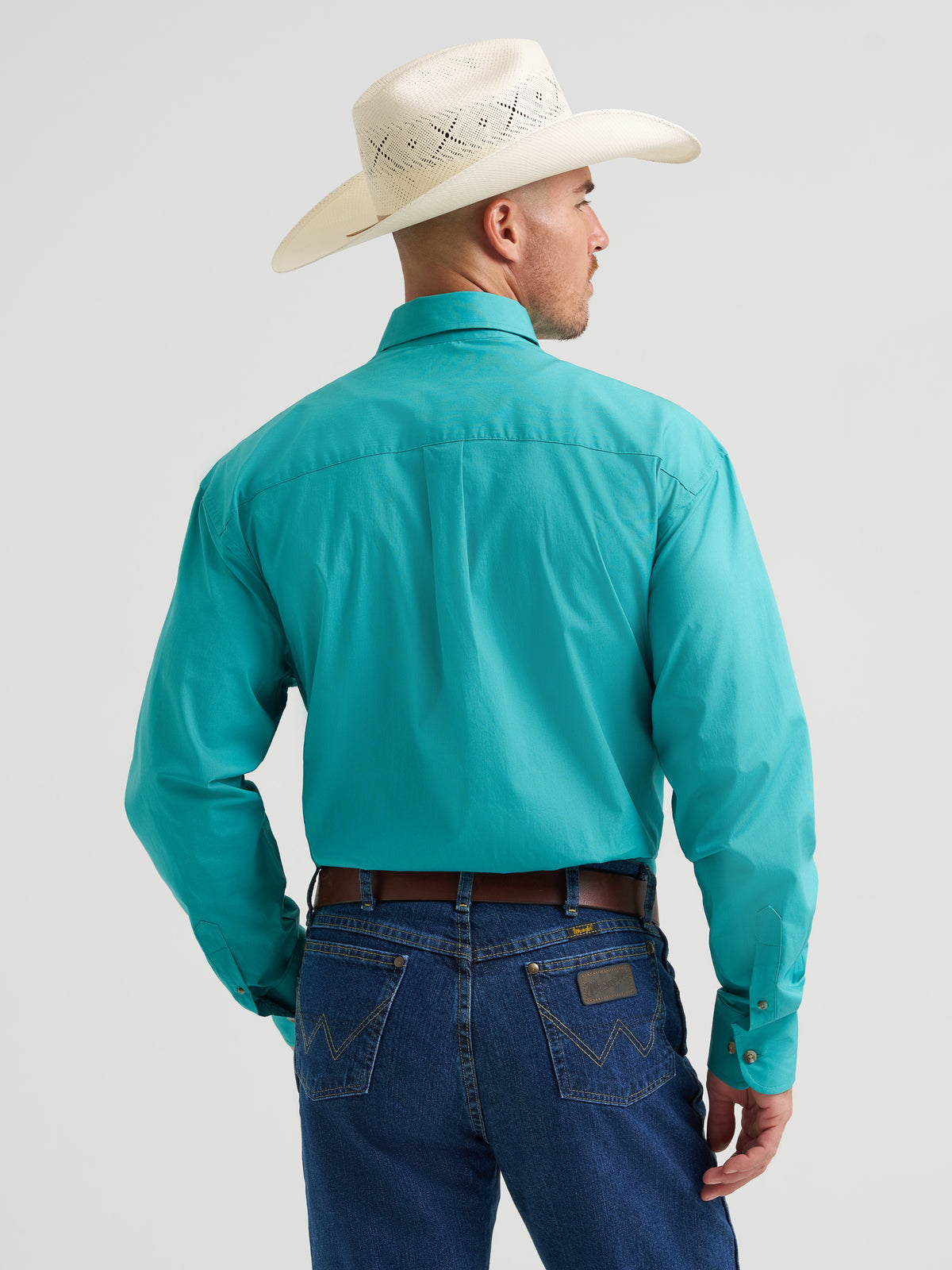 Wrangler Men's George Strait Collection aqua long sleeve shirt with one chest pocket, made of soft fabric, casual style.